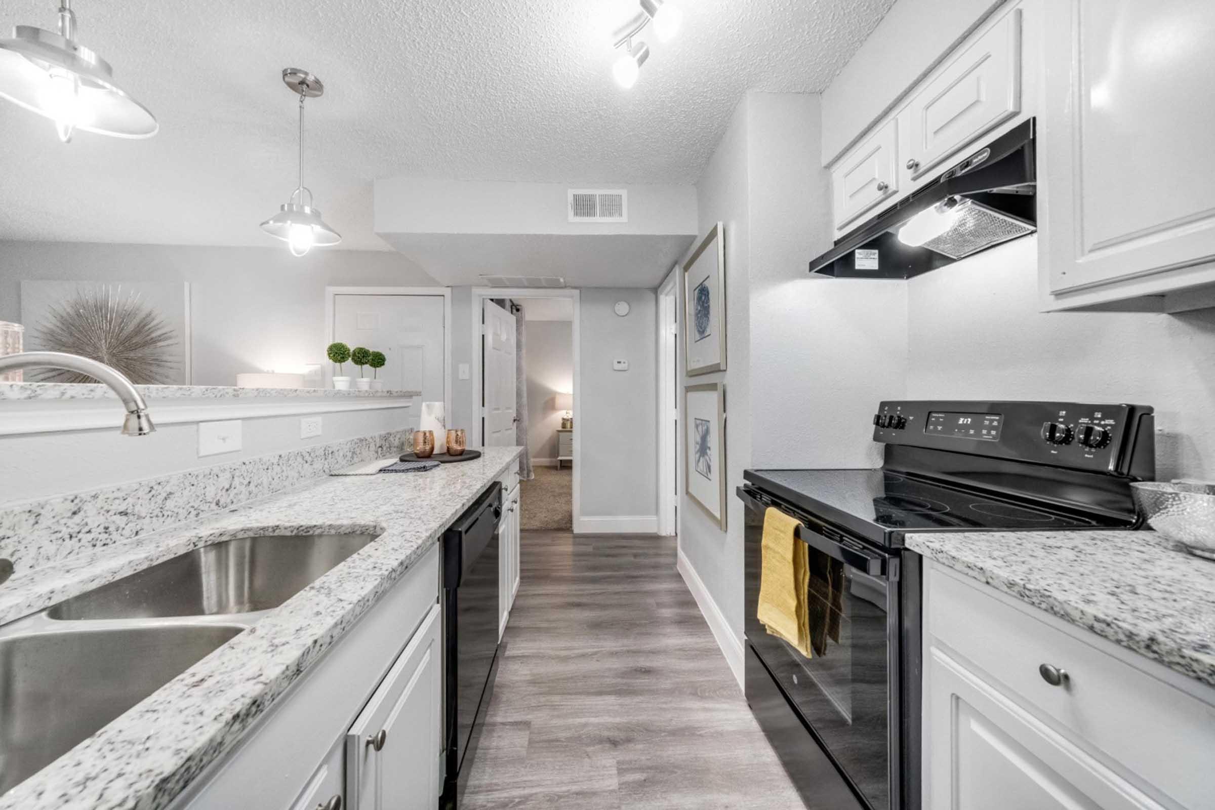 a modern kitchen with stainless steel appliances