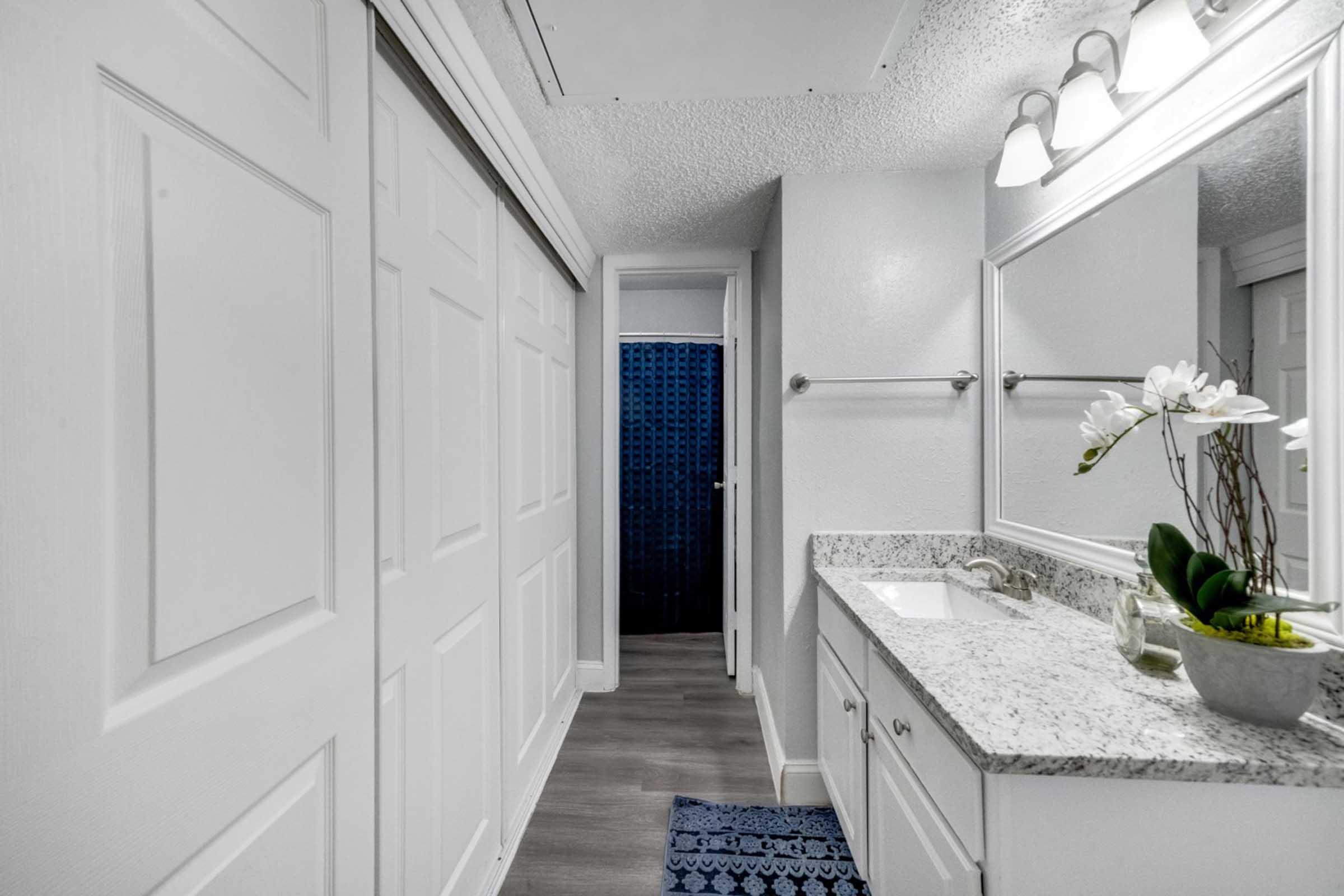 a kitchen with a sink and a window