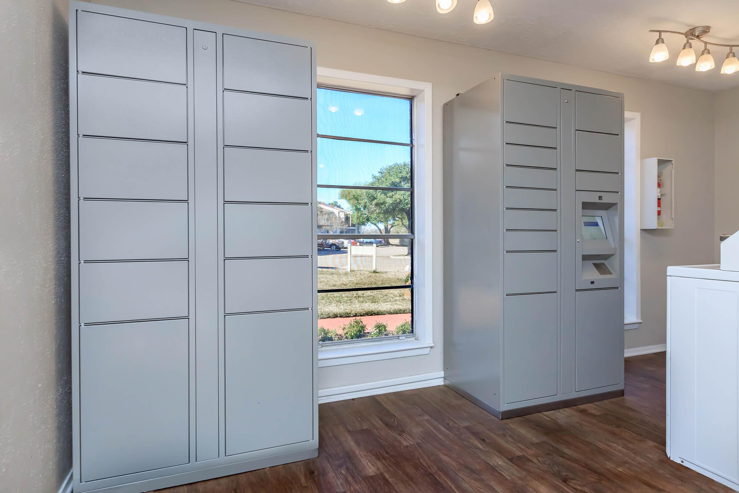 a large white refrigerator in a kitchen