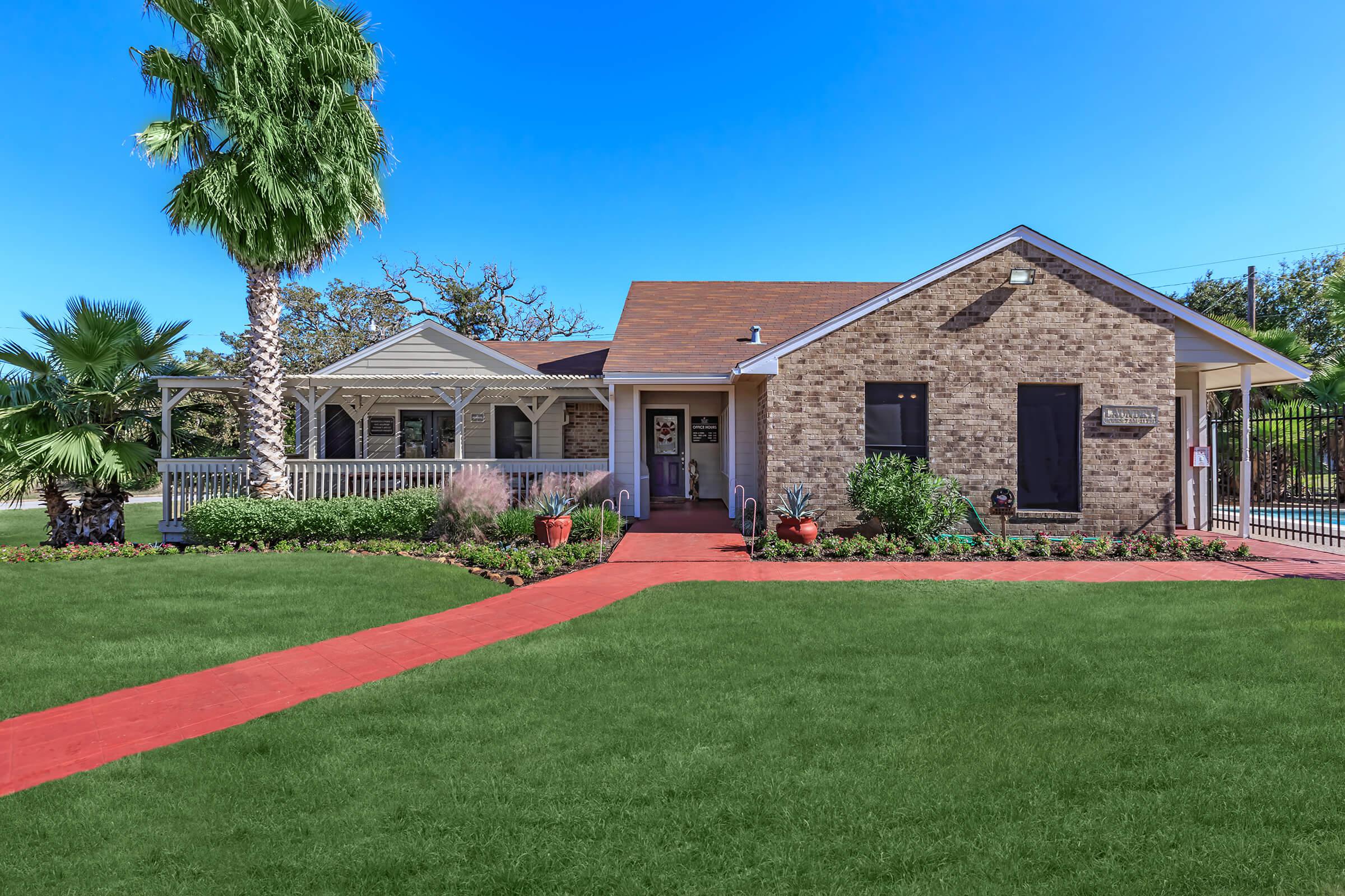 a large lawn in front of a house