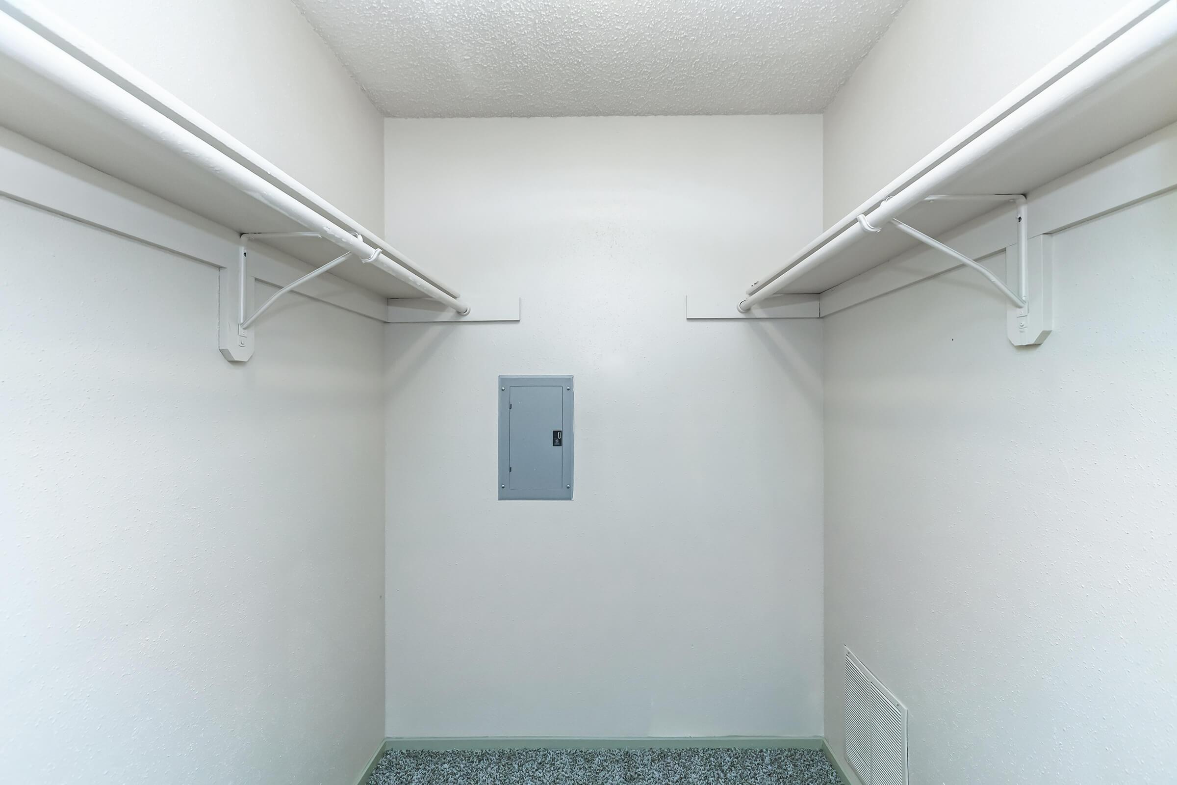 a white refrigerator freezer sitting in a room