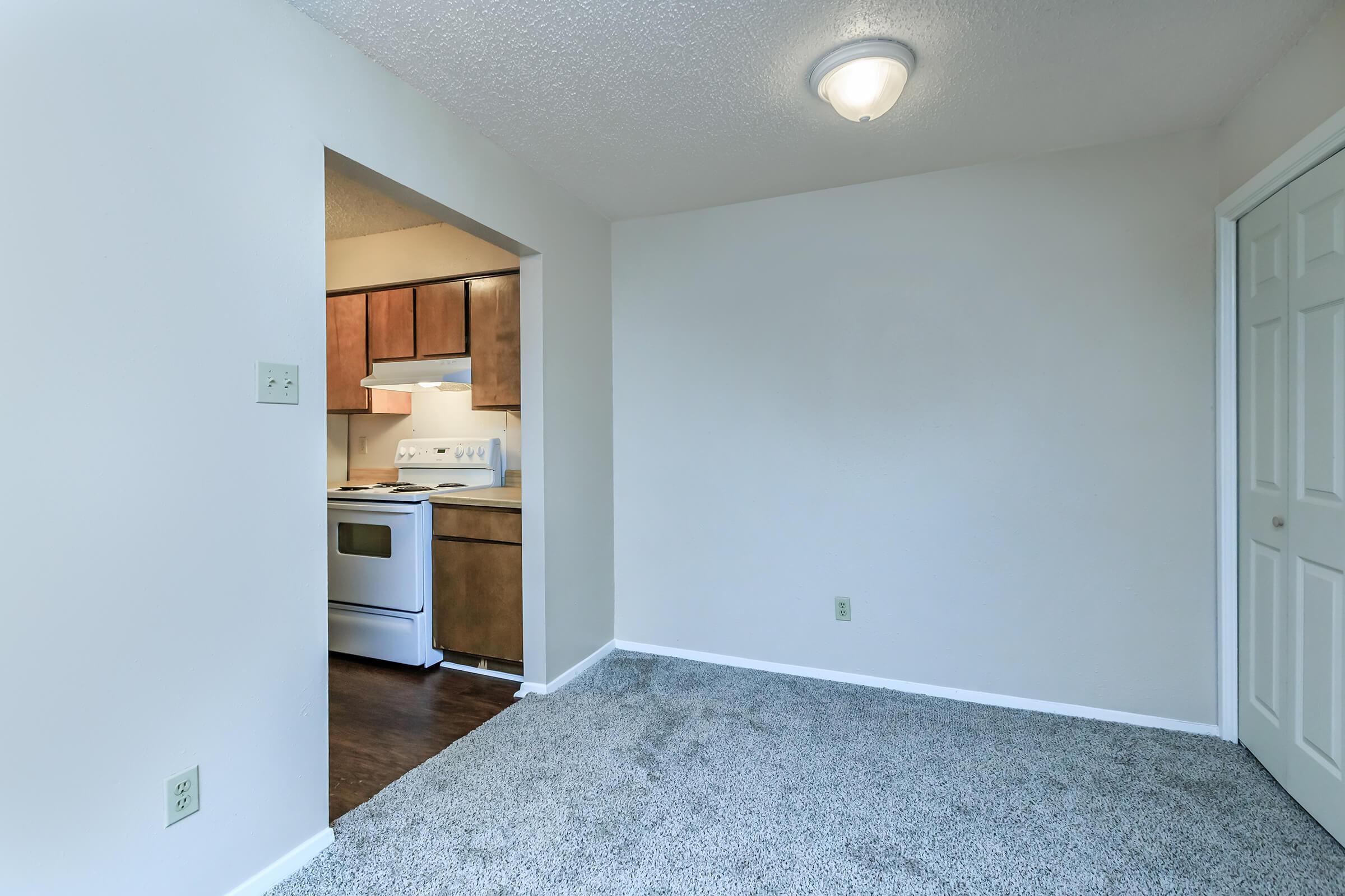 a bedroom with a large mirror