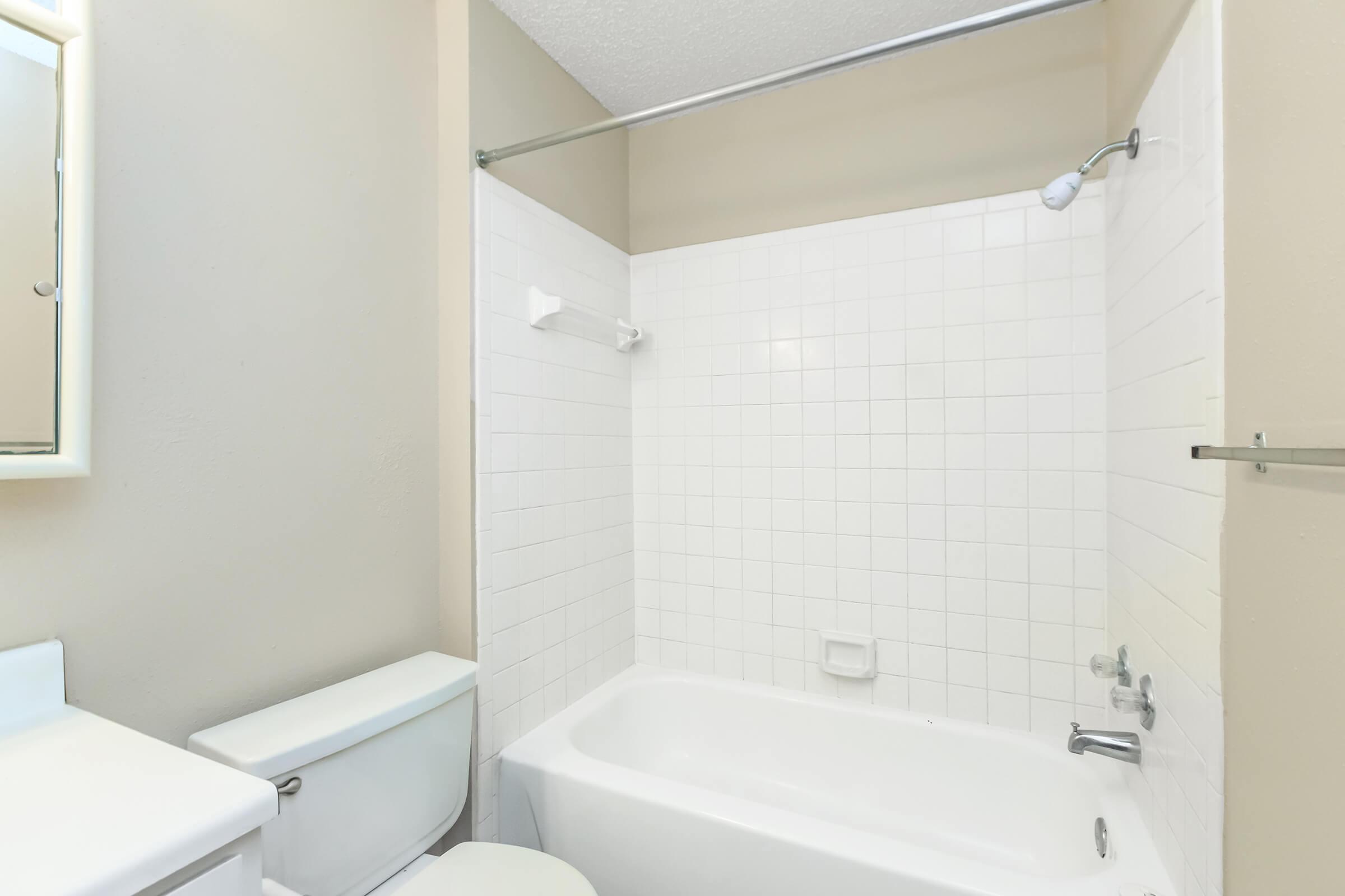 BATHTUB AND TILE SHOWER