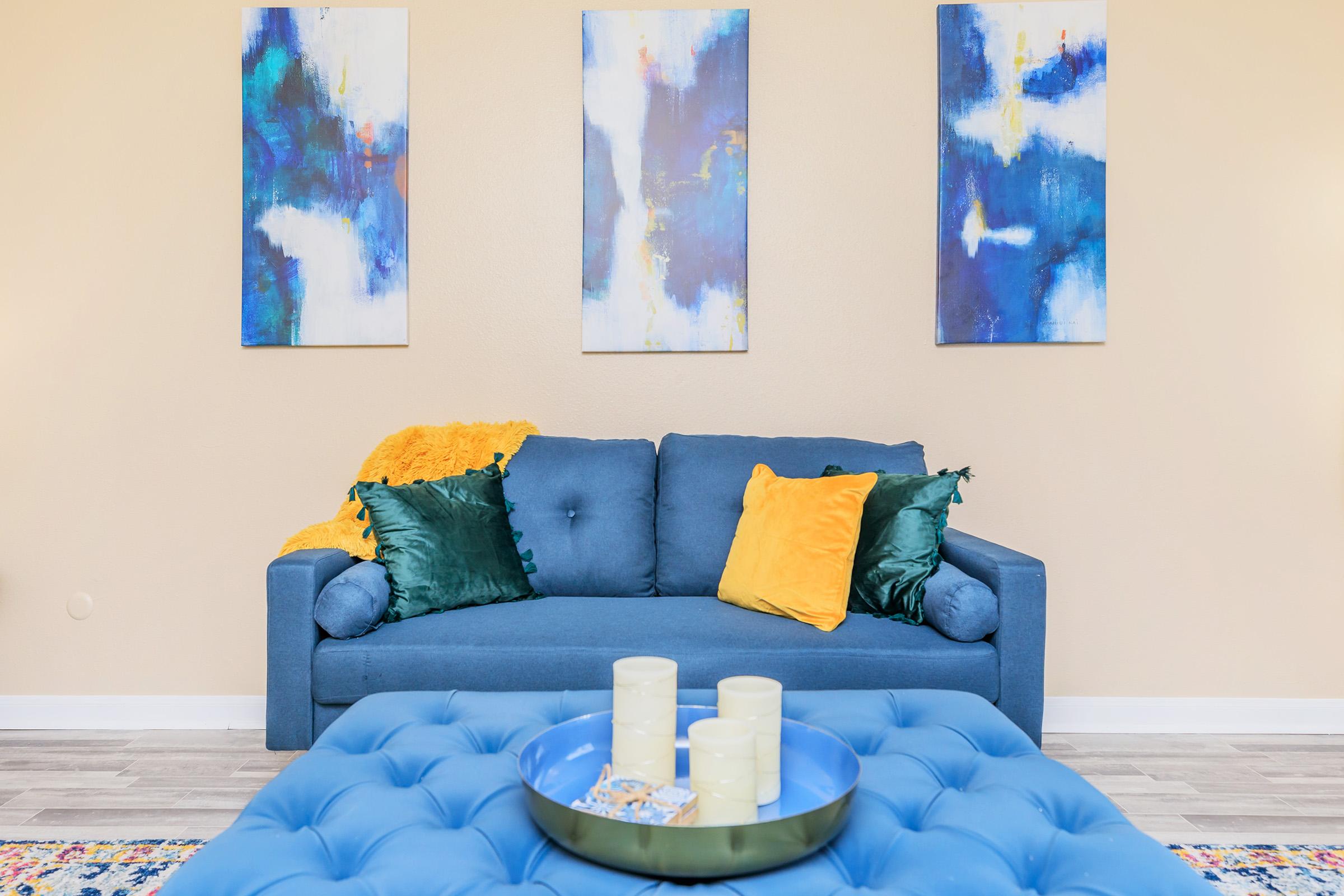 a living room with blue walls