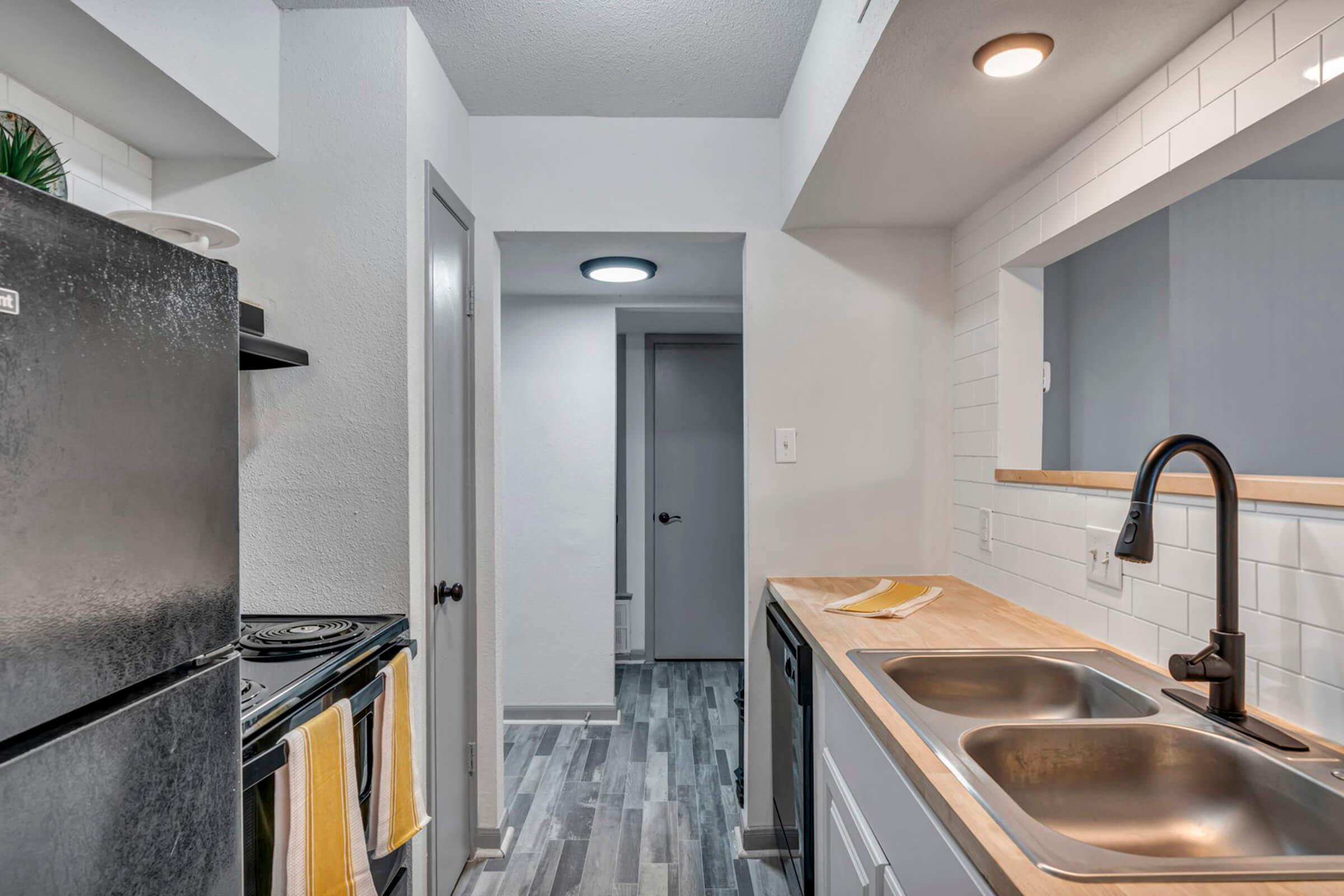 a stainless steel refrigerator in a kitchen