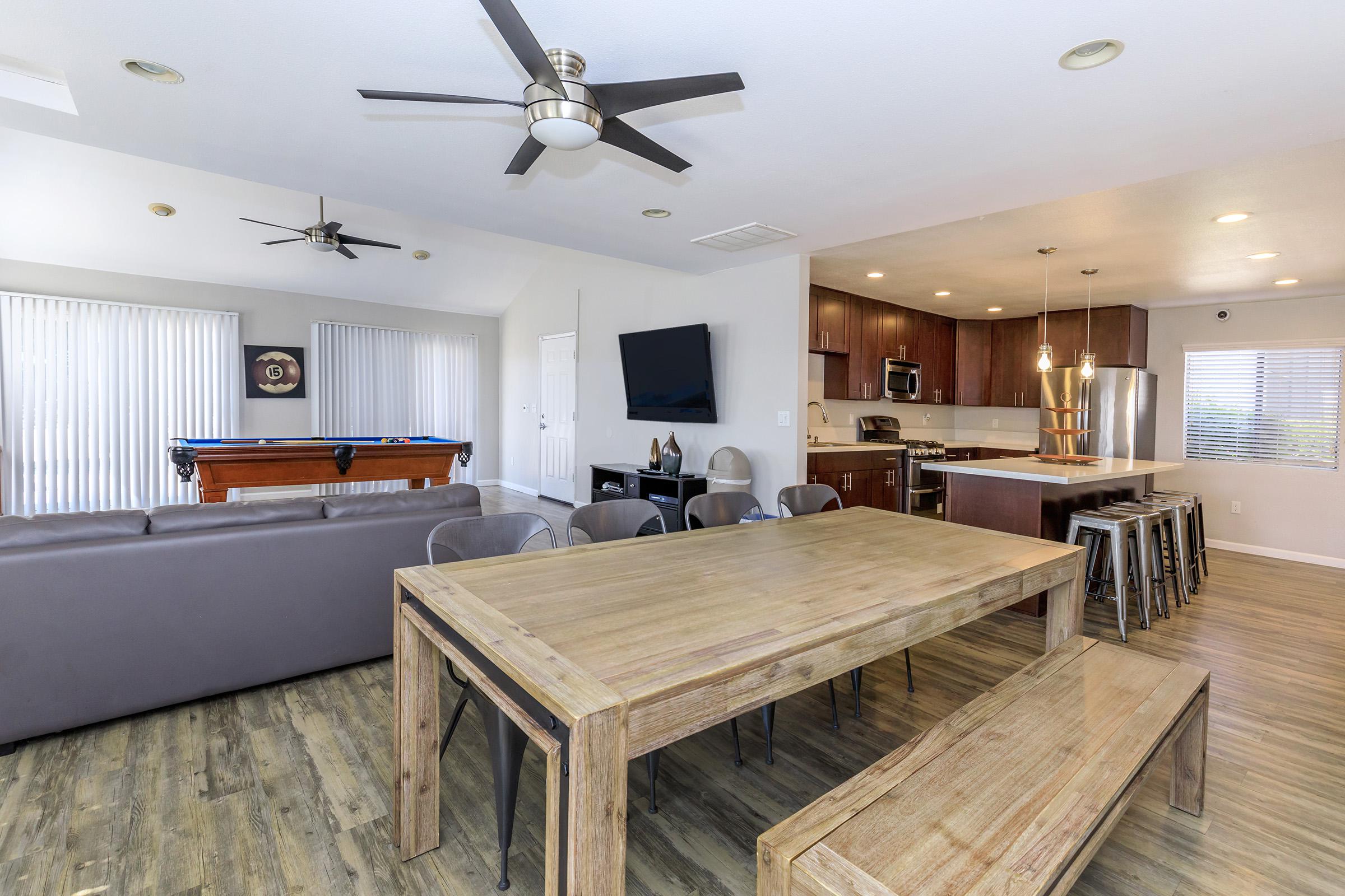 a room with a wooden table