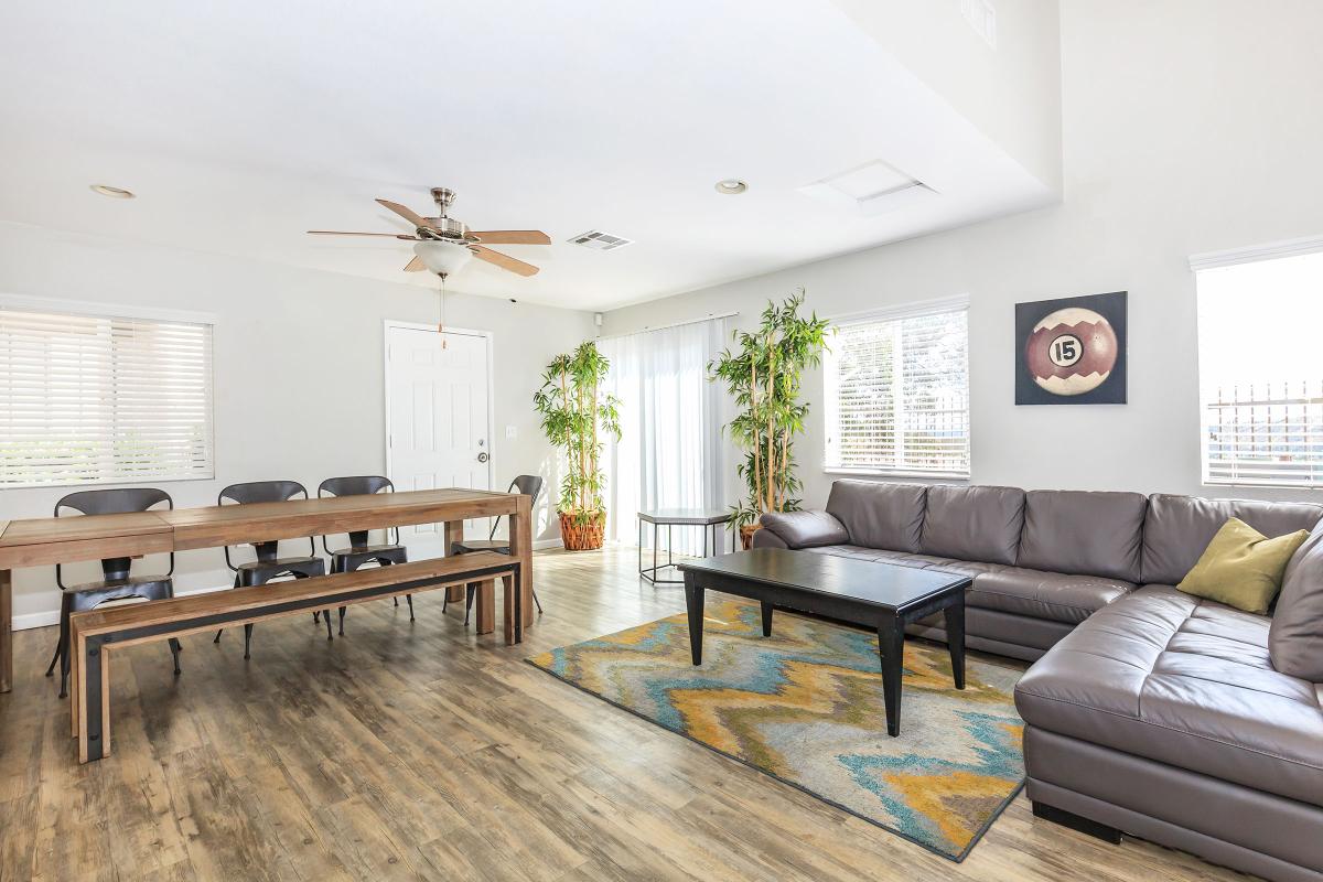 a living room filled with furniture and a fireplace