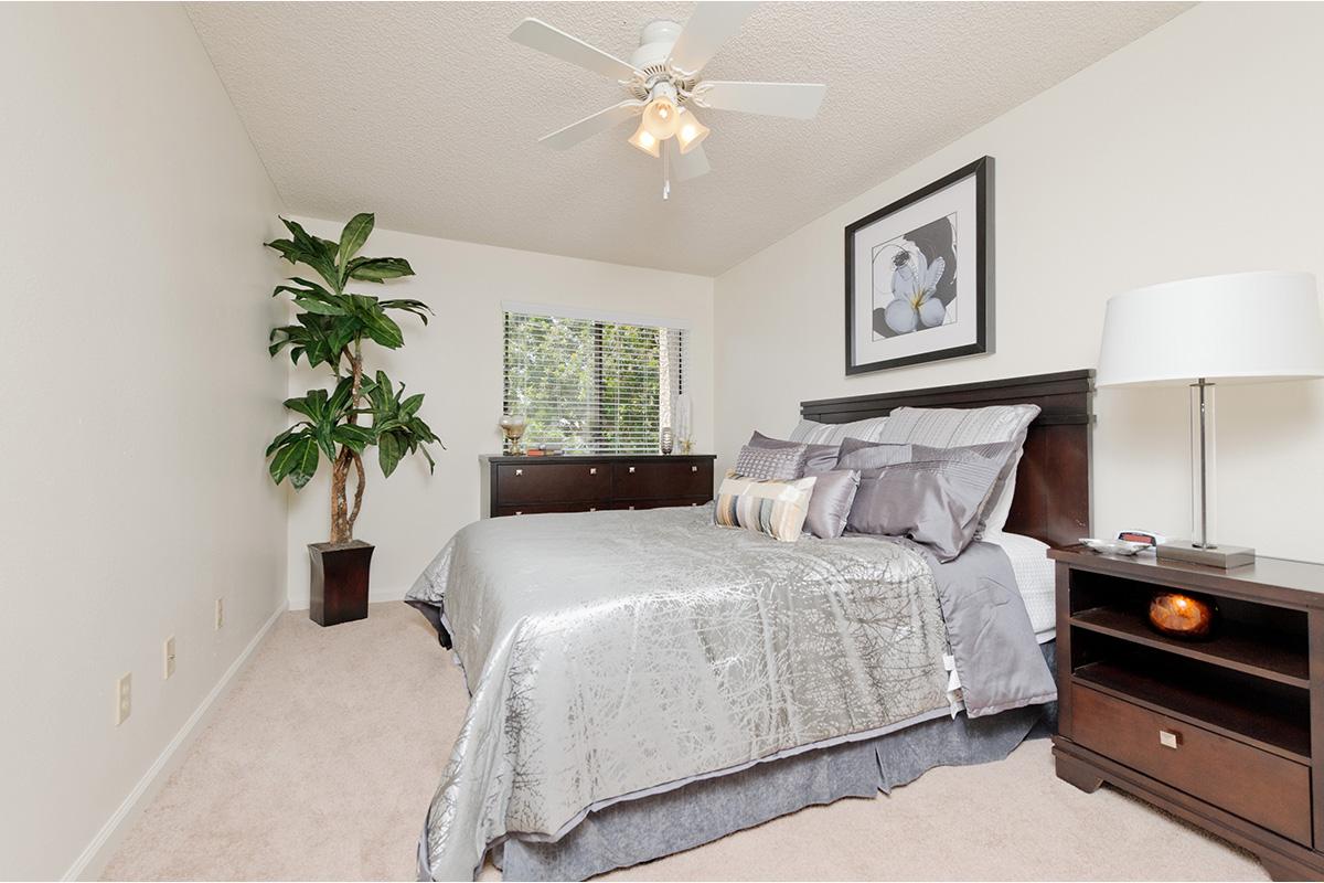 a living room filled with furniture and a flat screen tv