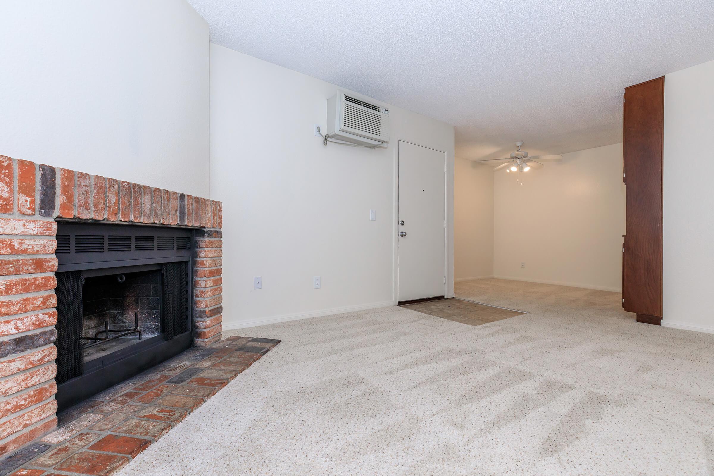 a living room with a fireplace