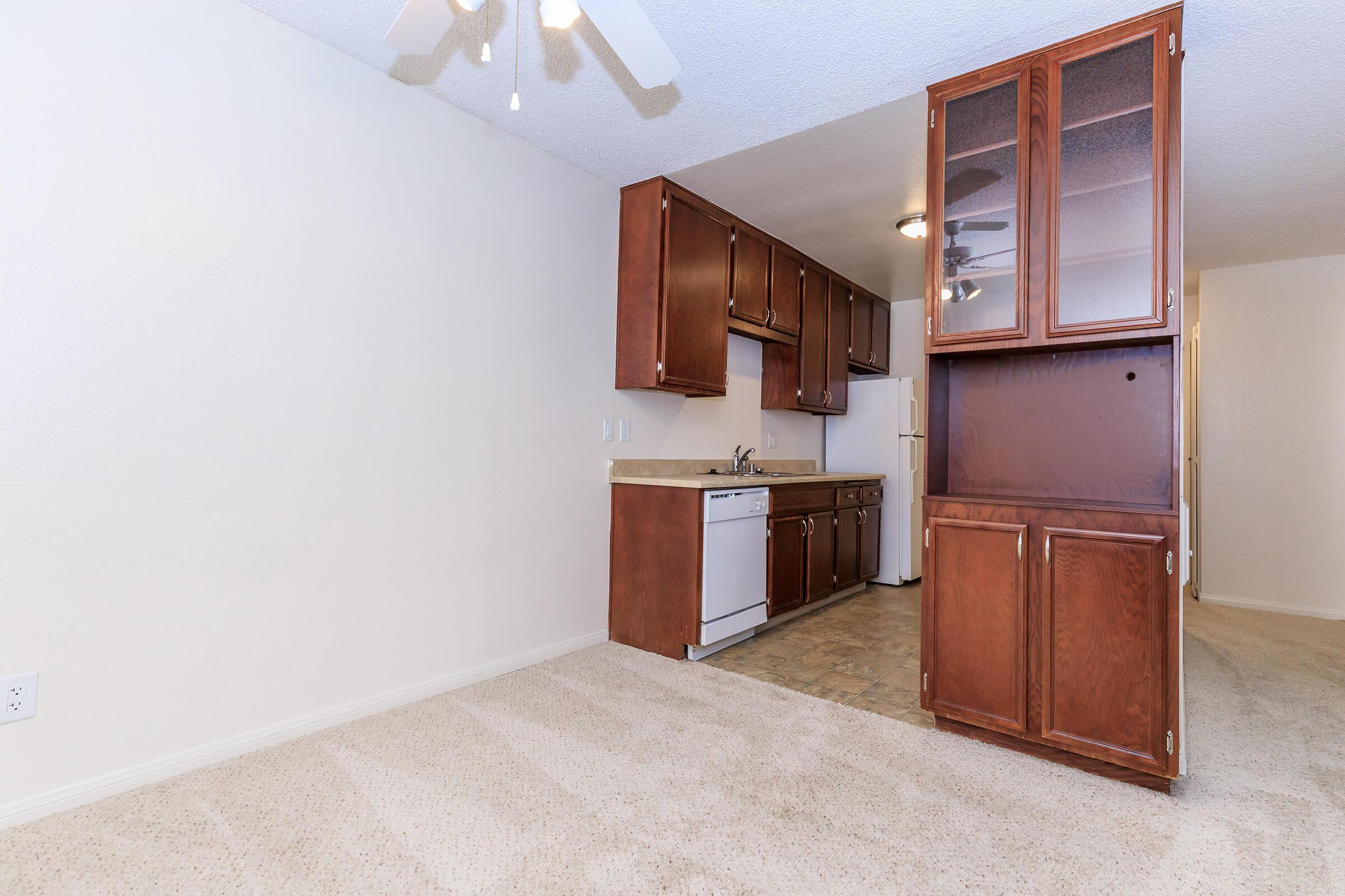 a white refrigerator freezer sitting in a room