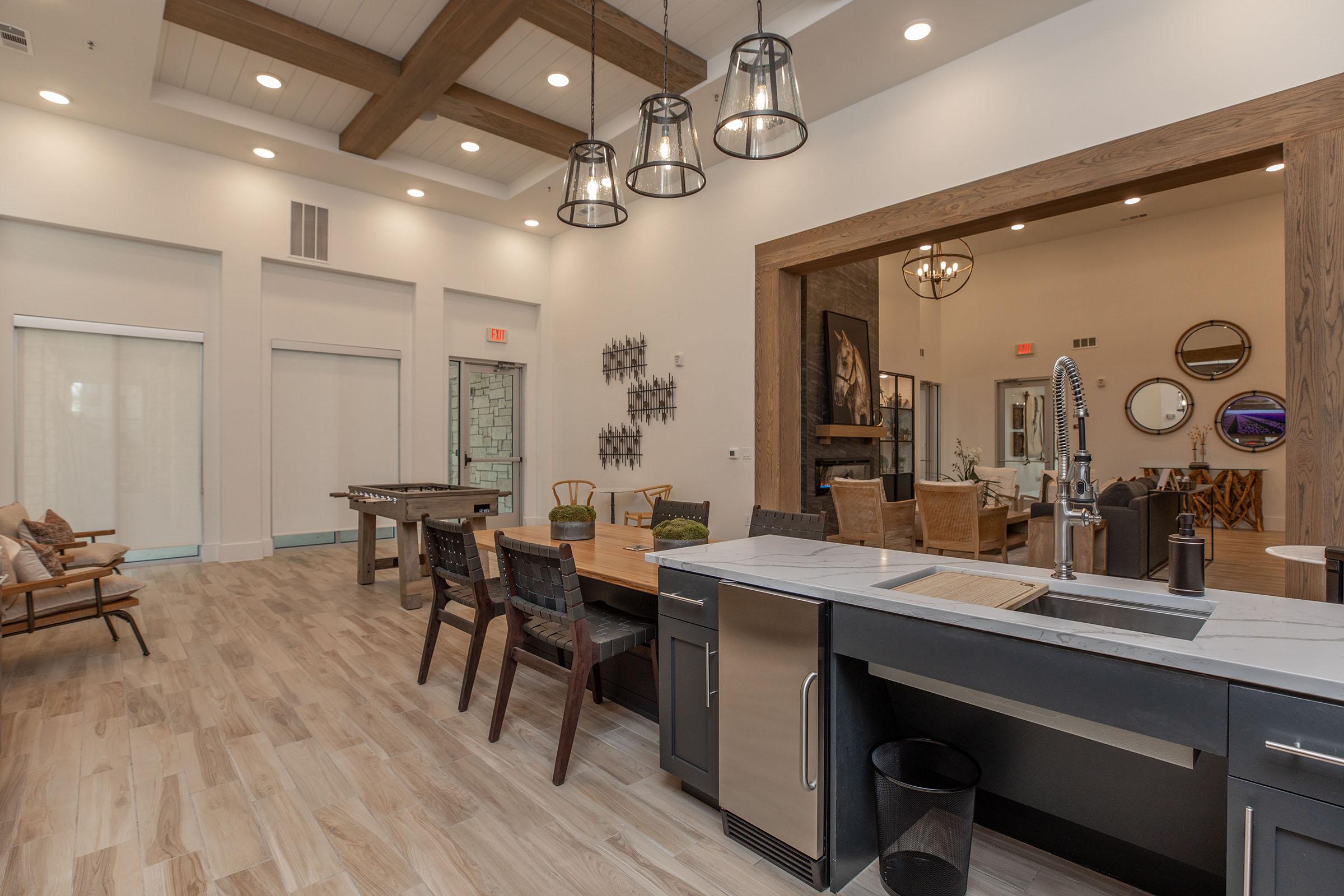 a room filled with furniture and a wood floor