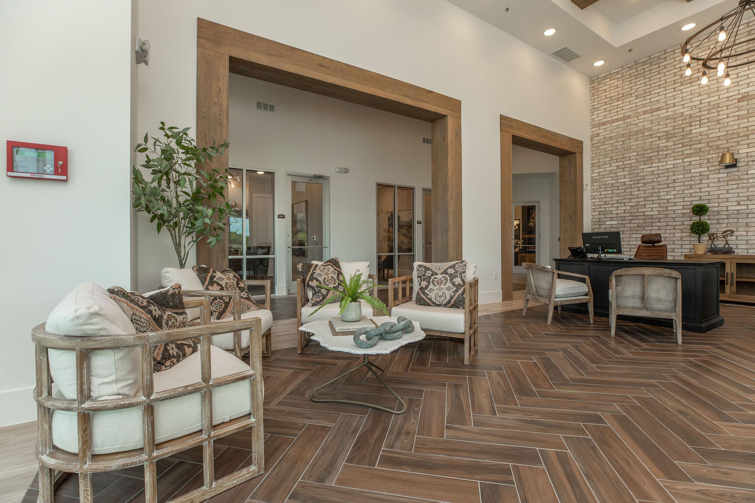 a living room filled with furniture and a fireplace