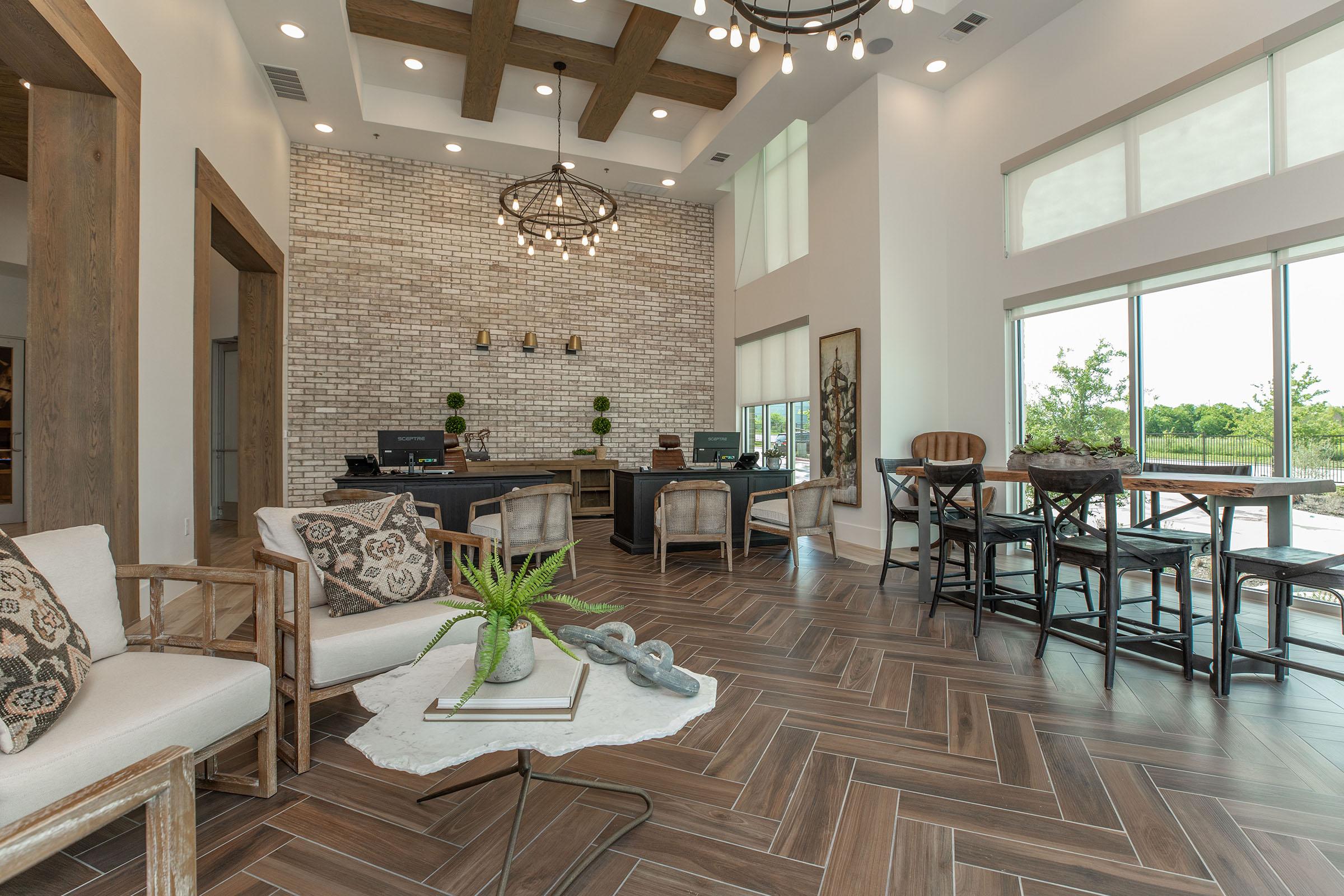 a living room filled with furniture and a fireplace
