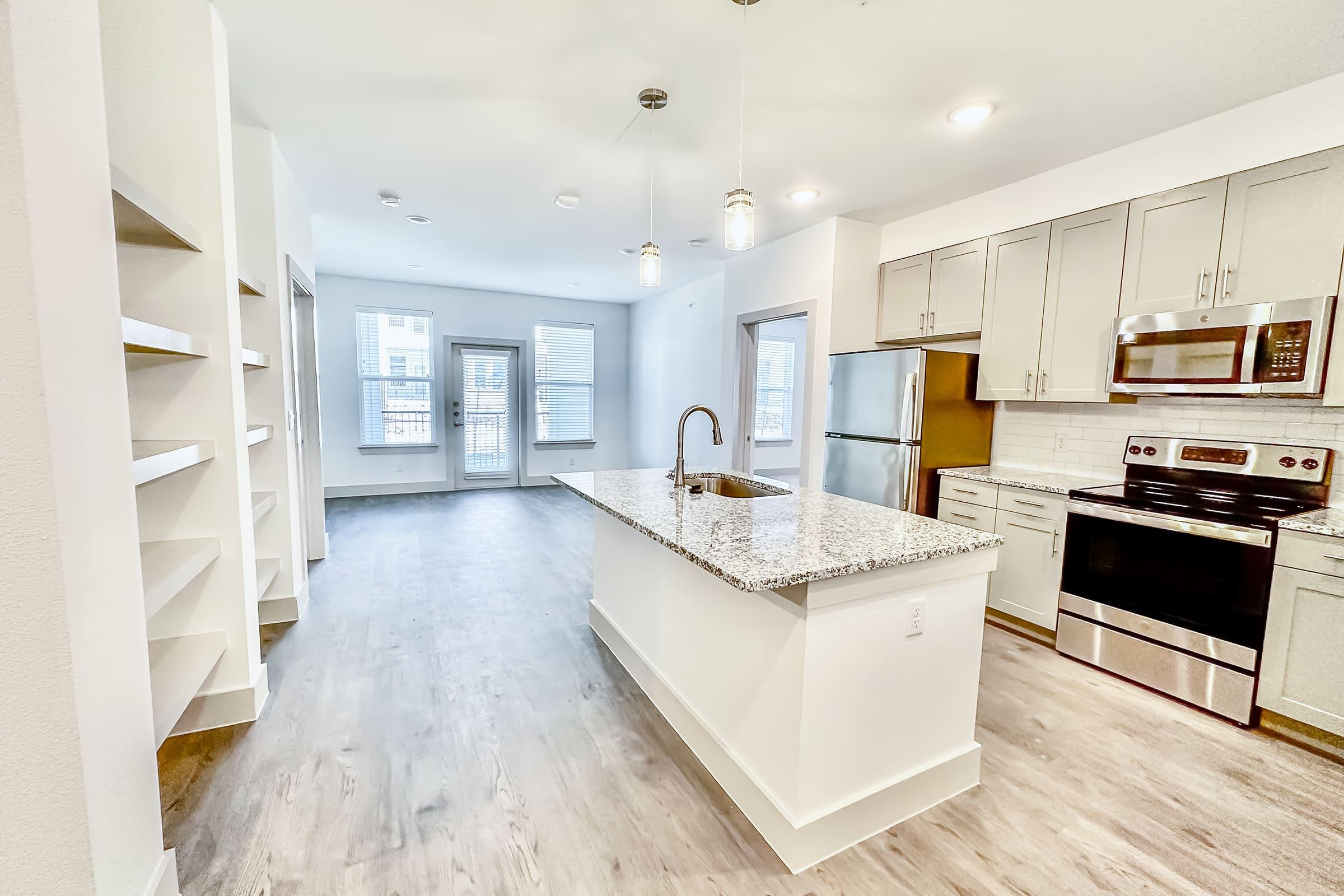 a room filled with furniture and a sink