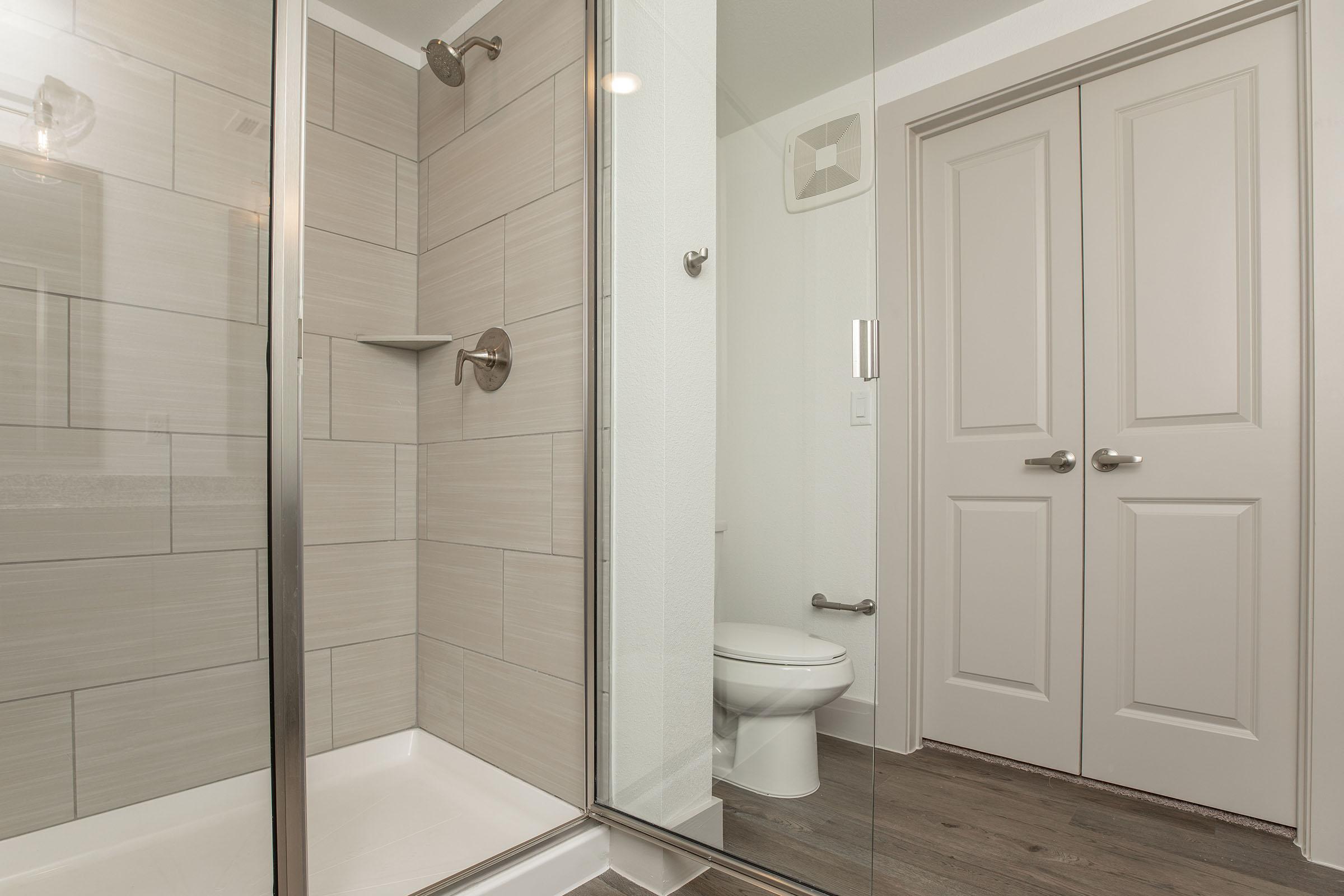 a room with a sink and a mirror