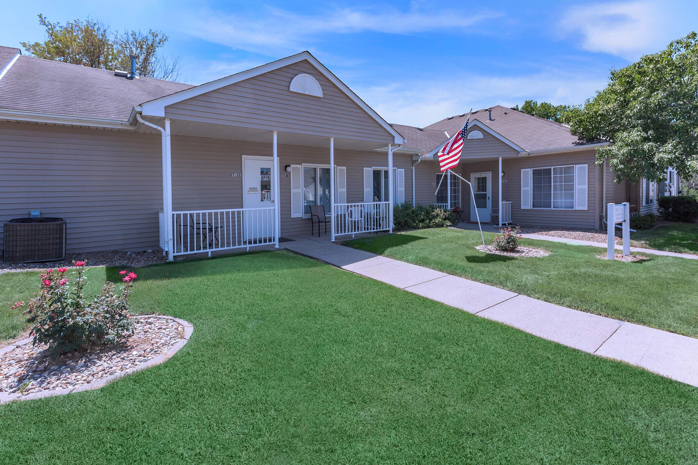 a large lawn in front of a house