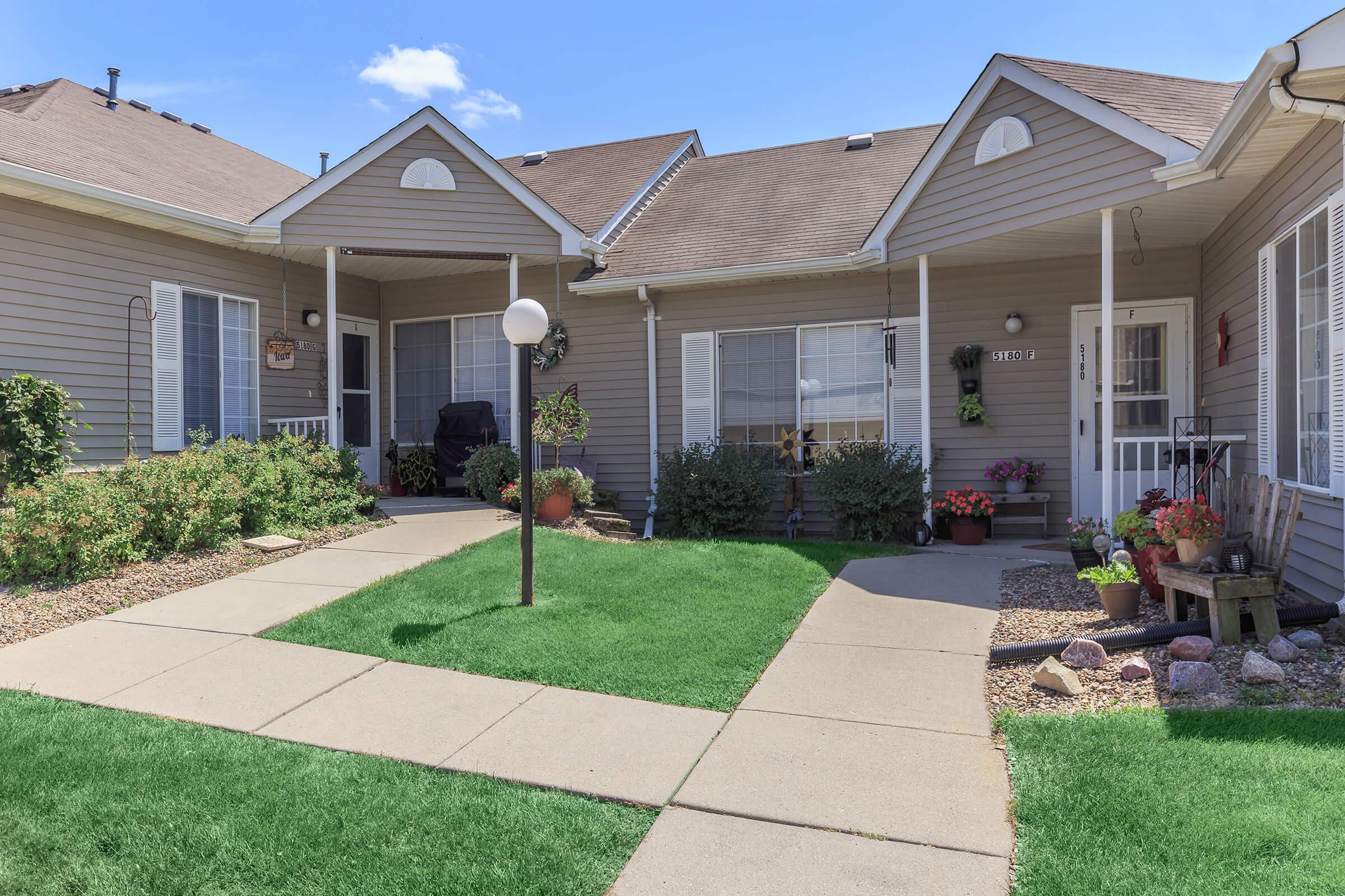 a large lawn in front of a house