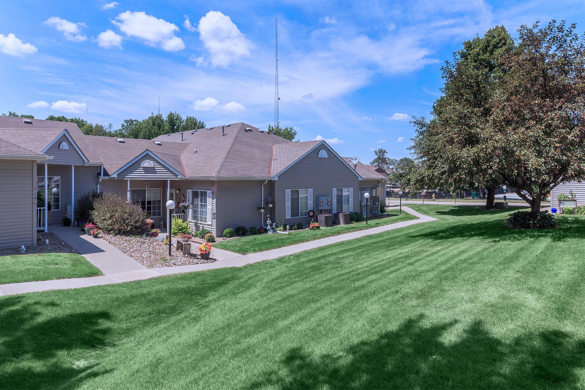 a large lawn in front of a house