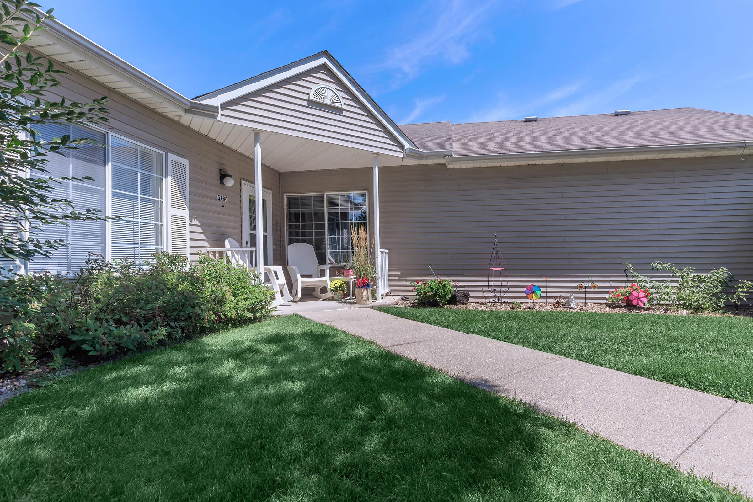 a large lawn in front of a house