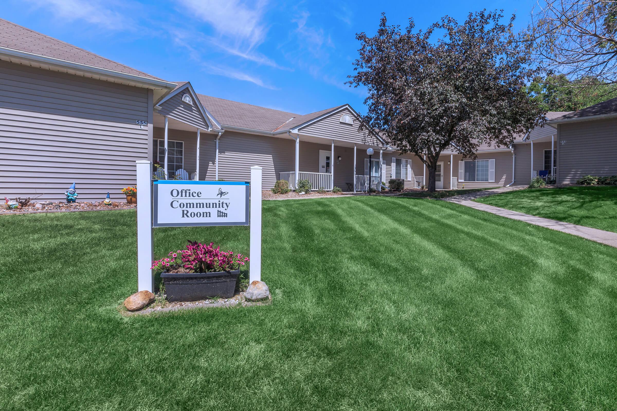 a large lawn in front of a house