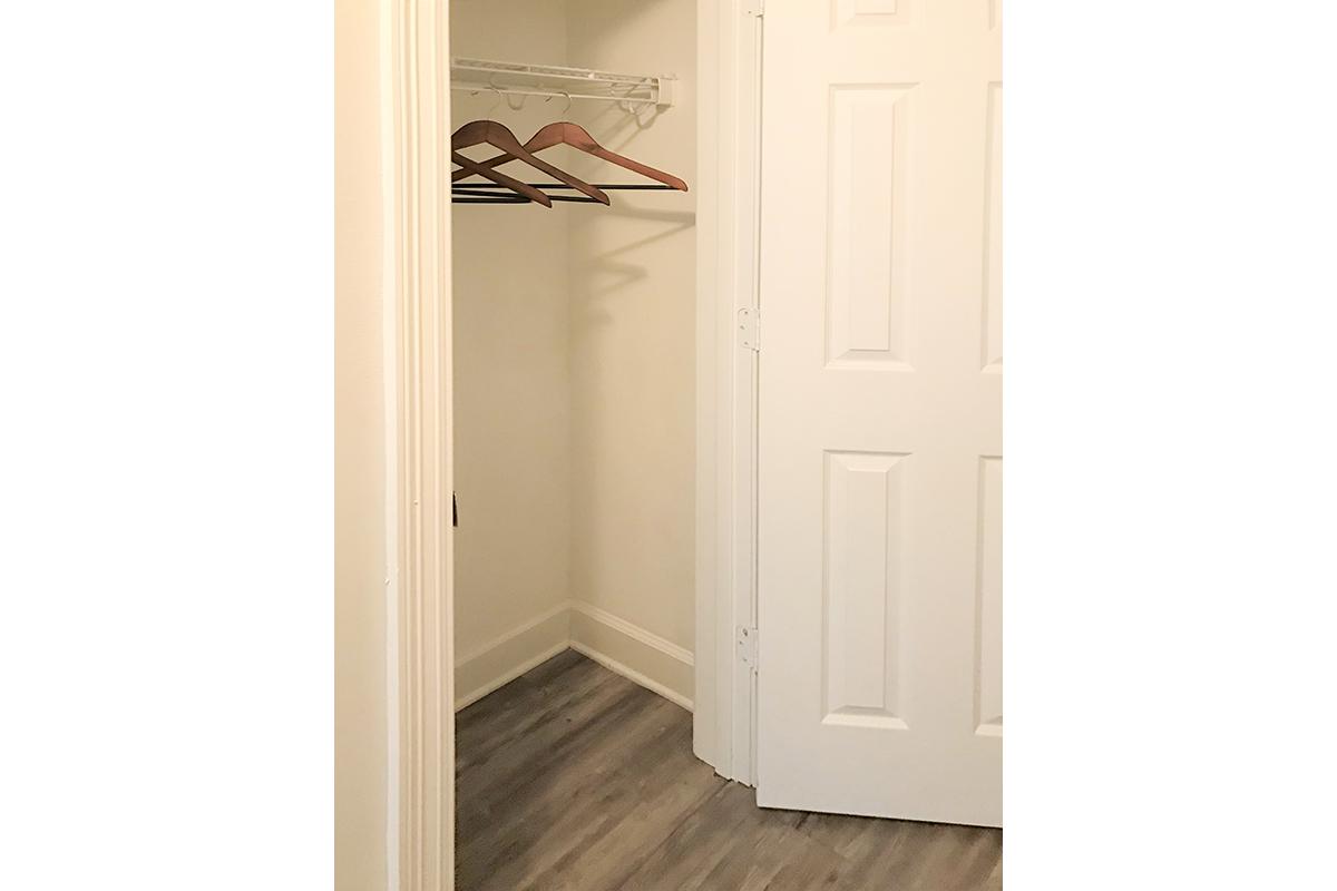 a white refrigerator freezer sitting inside of a building