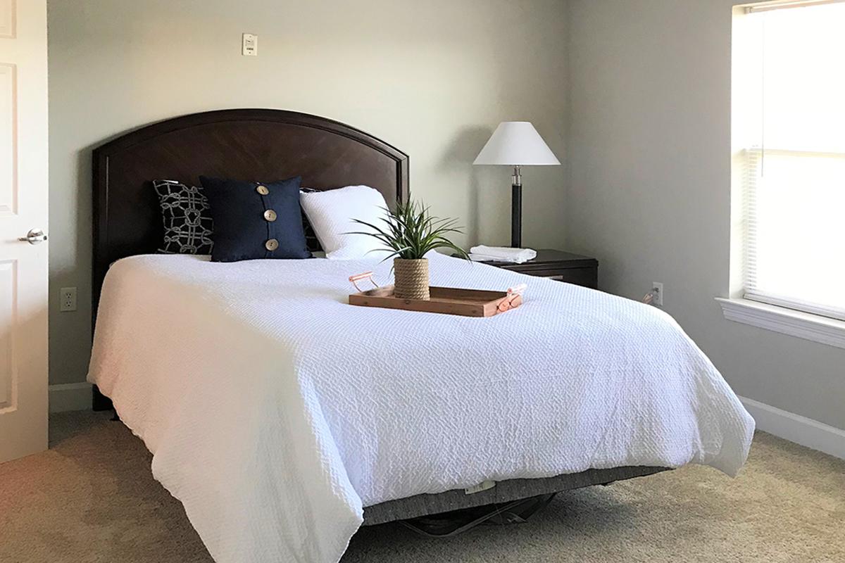 a bedroom with a bed in a hotel room