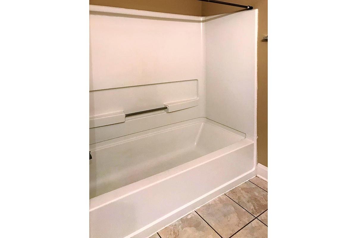 a white refrigerator freezer sitting in a room