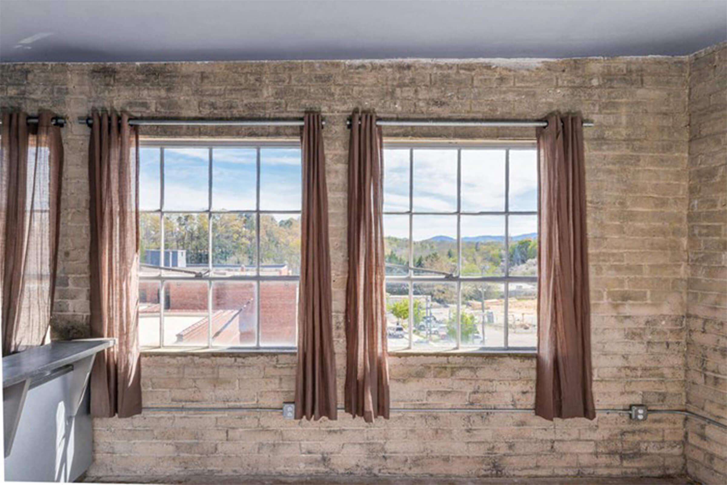 Beautiful exposed brick walls at The Lofts at South Slope in Asheville, NC.