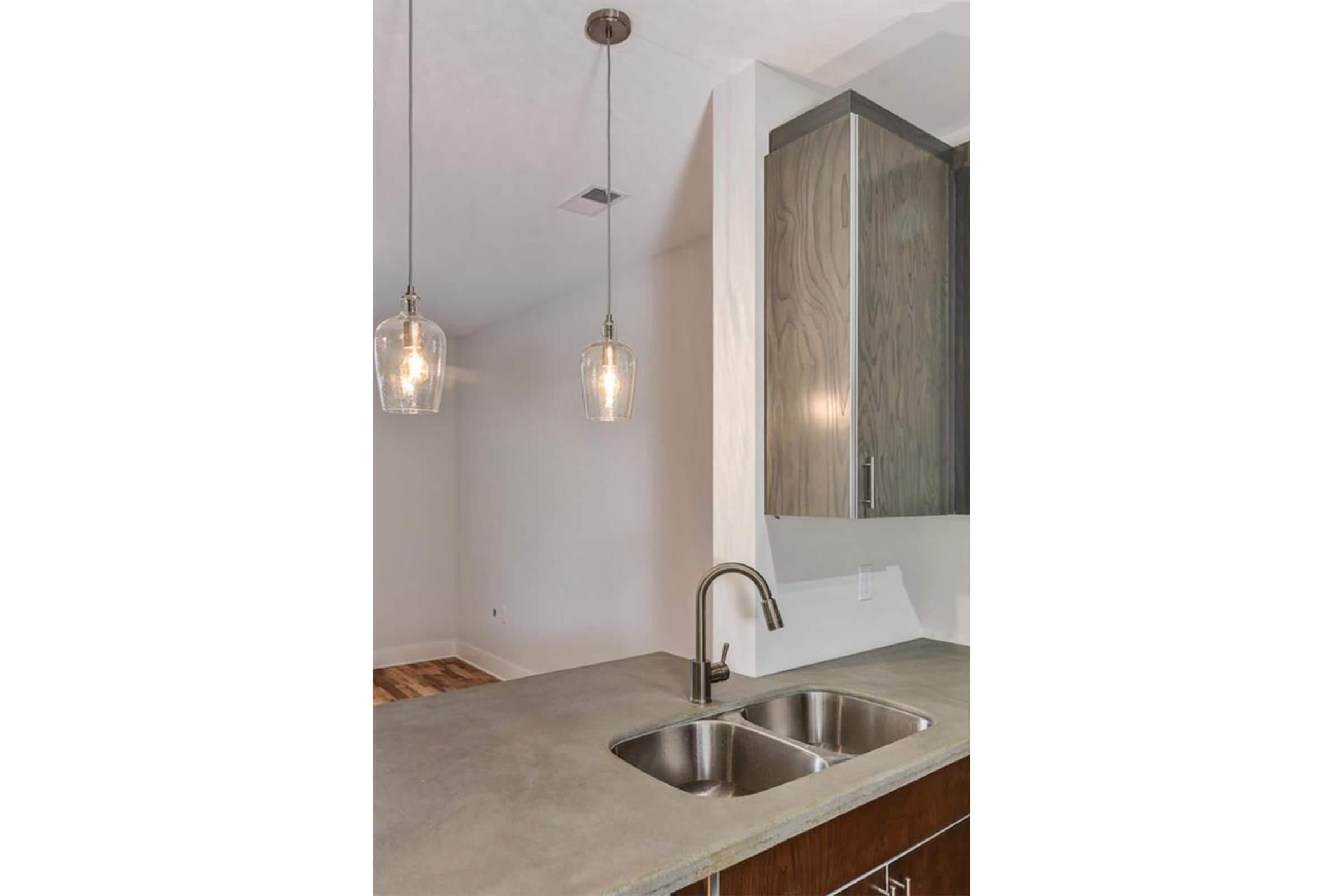 Gooseneck faucets available at The Lofts at South Slope in Asheville, NC.