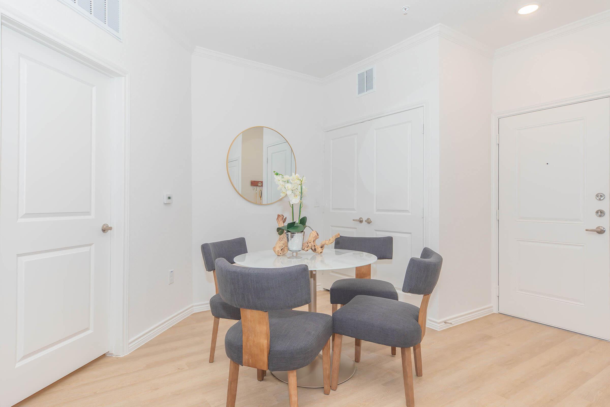 a living room with a wooden floor