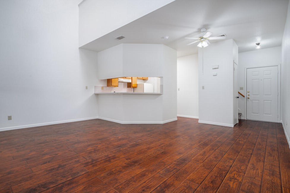 a kitchen with a wood floor