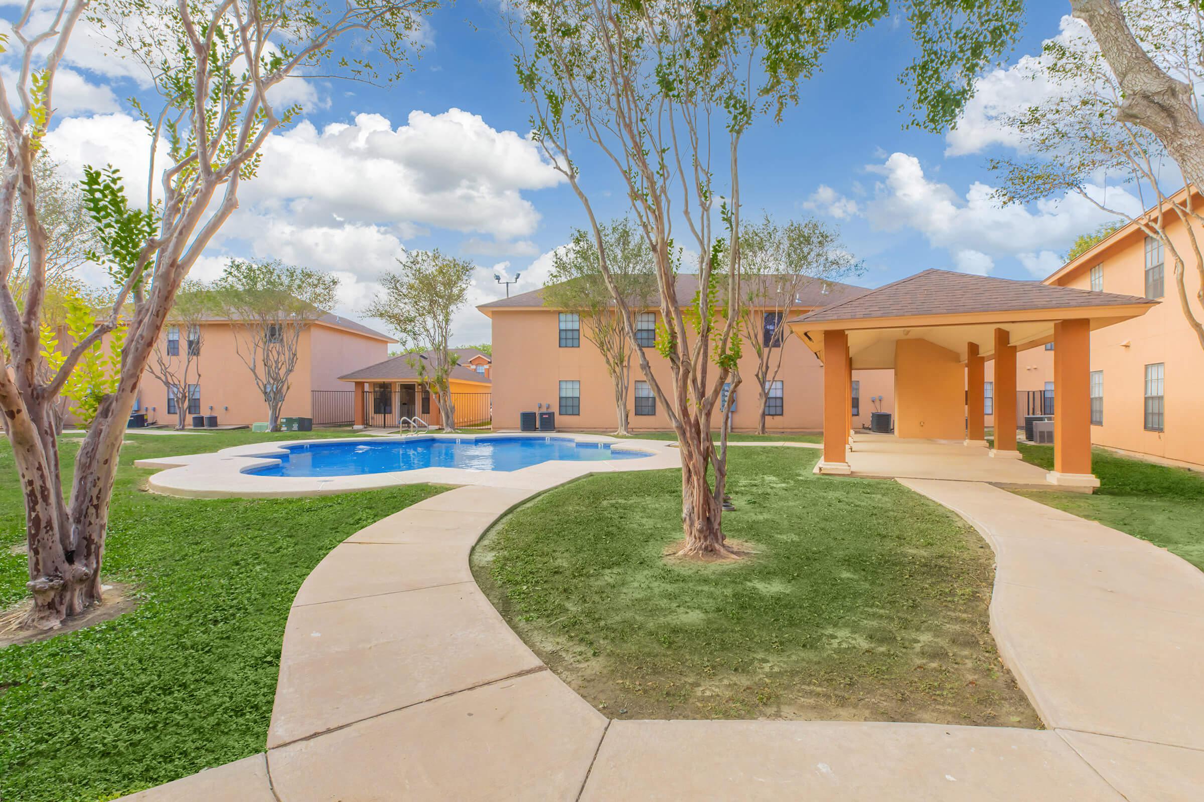 a large lawn in front of a house