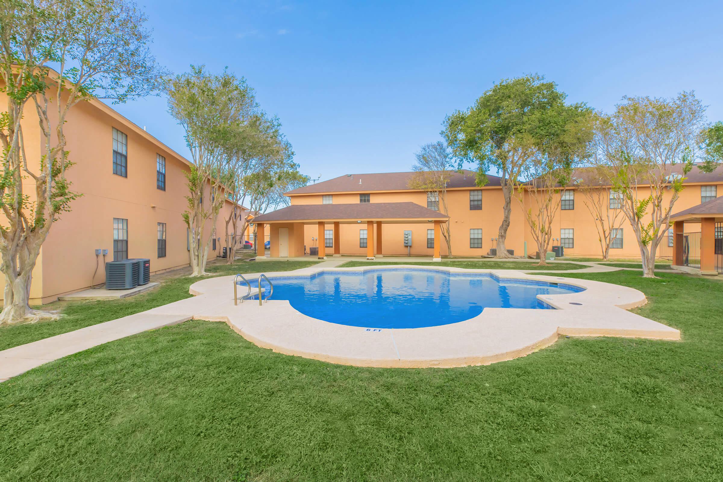 a large lawn in front of a house