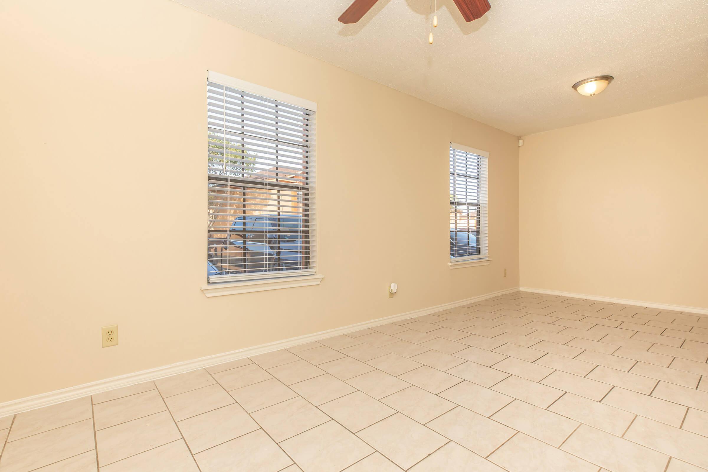 TILE FLOORS AND VAULTED CEILINGS IN TWO BEDROOM APARTMENT FOR RENT.