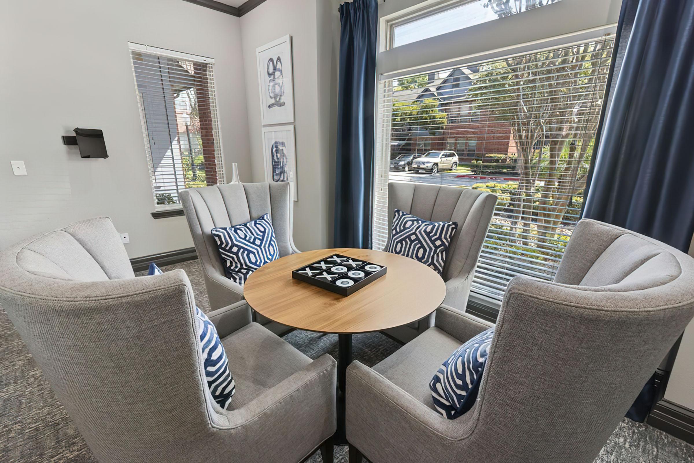 a living room with a leather chair