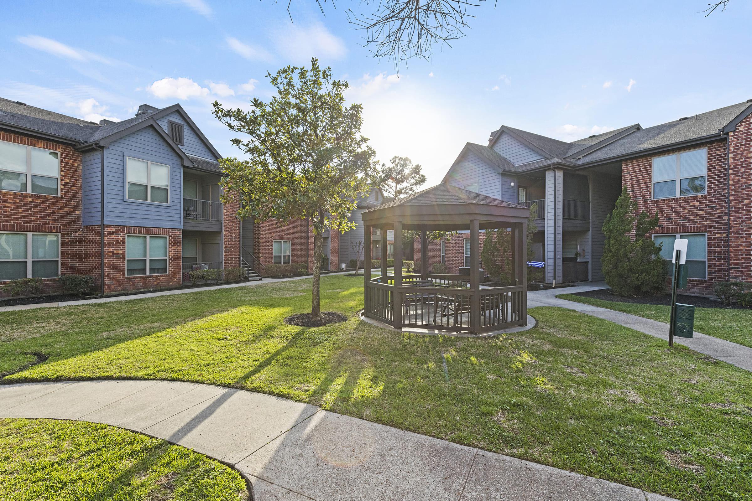 a large lawn in front of a house