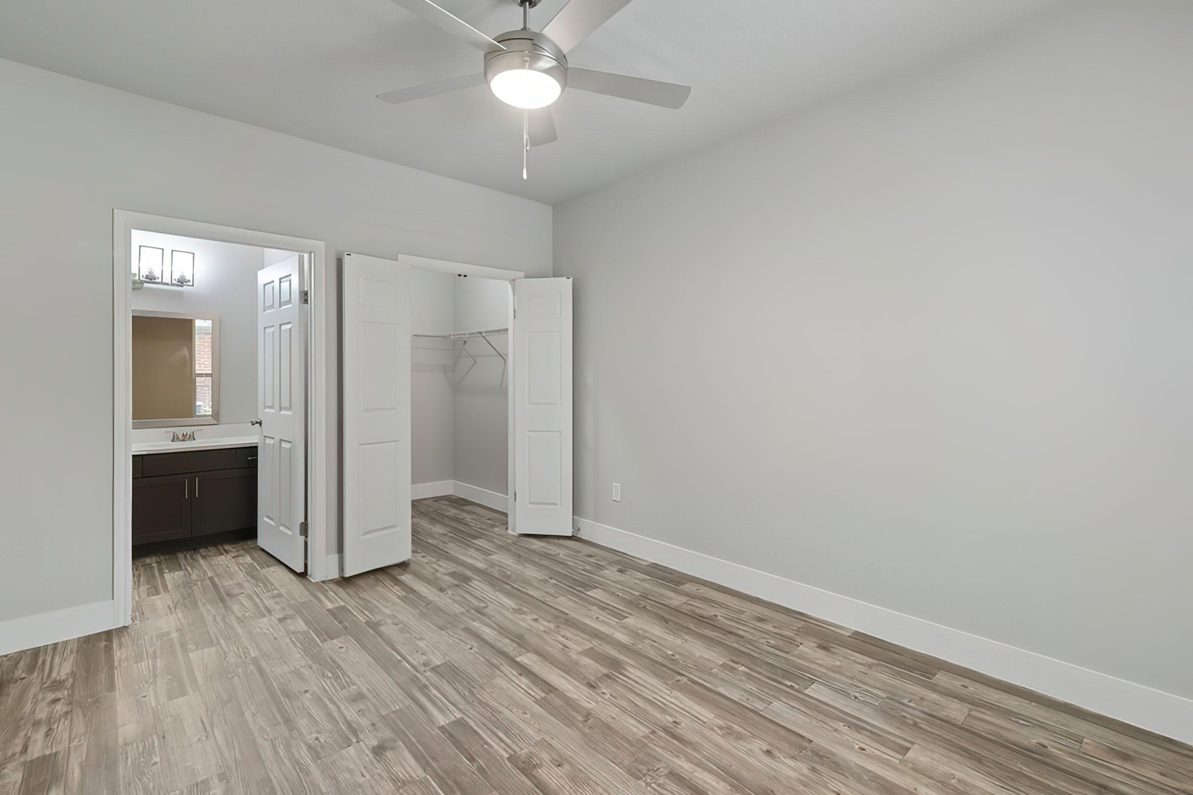 a kitchen with a wooden floor