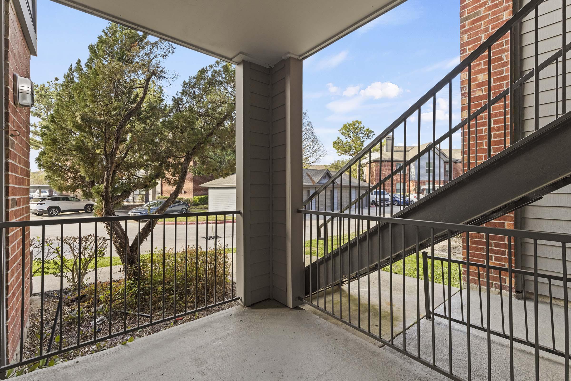 a building with a metal fence