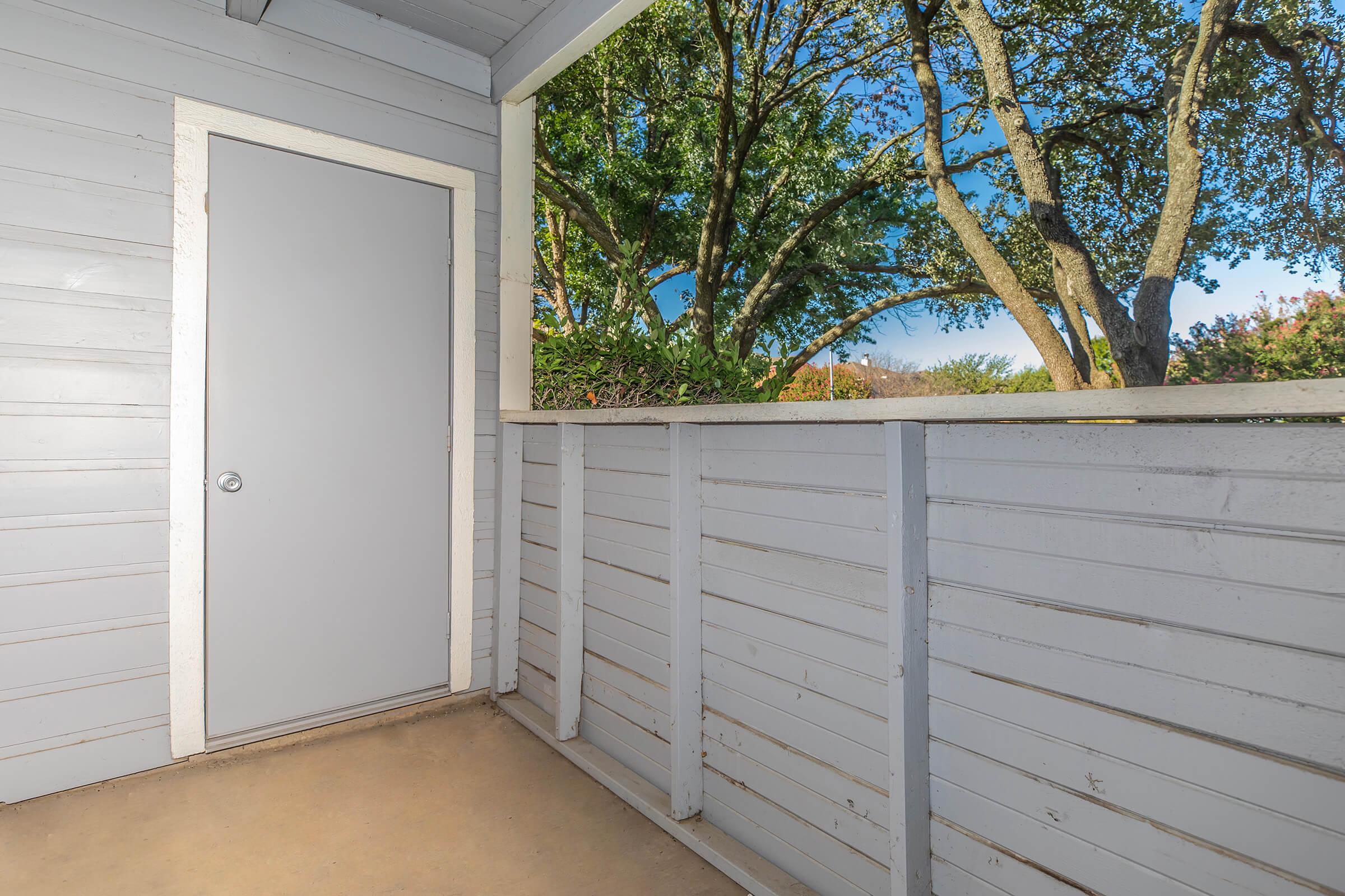 A closed storage space on the apartment balcony at Rise Oak Creek..