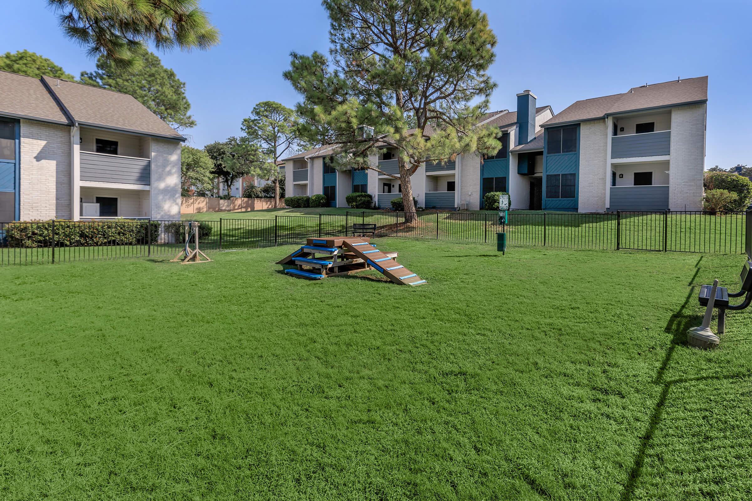 The dog park at Rise Oak Creek near the apartments.