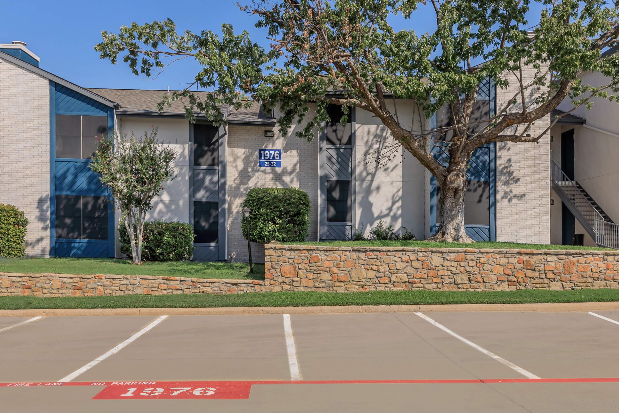 The empty parking lot at Rise Oak Creek near the apartments.