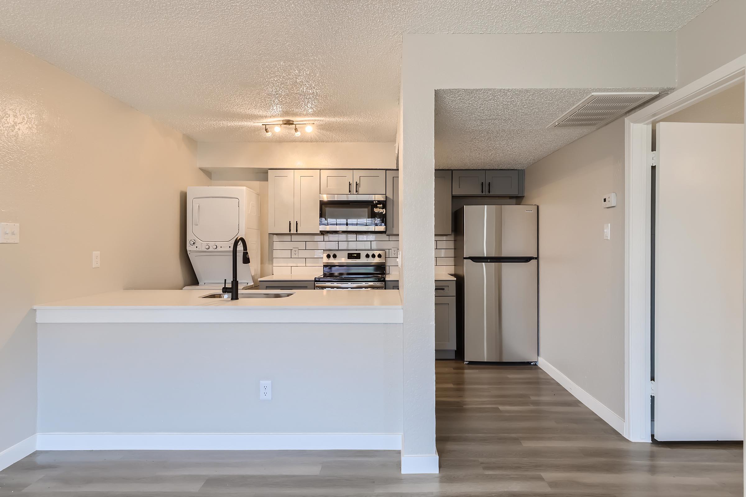 a view of a kitchen