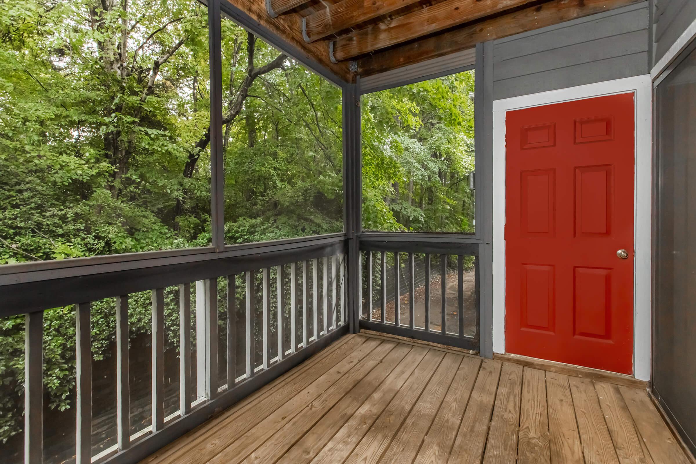 a room with a wooden fence