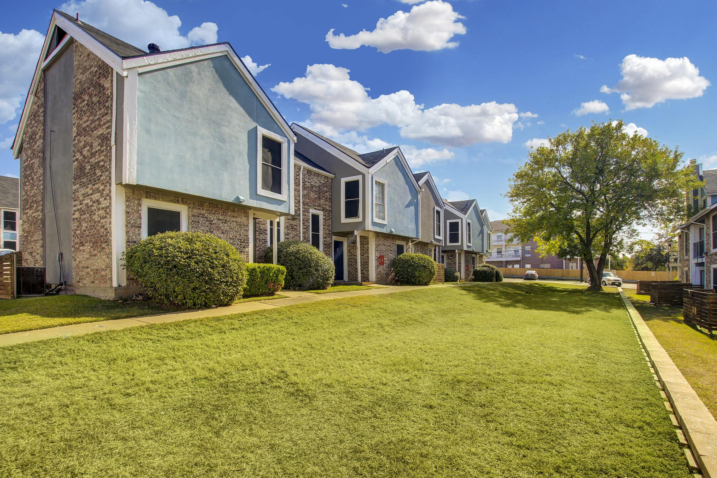 a large lawn in front of a house