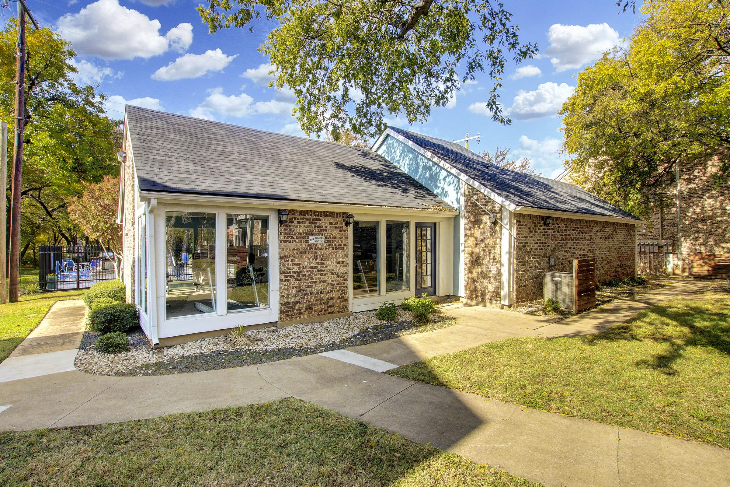 a stone path in front of a house