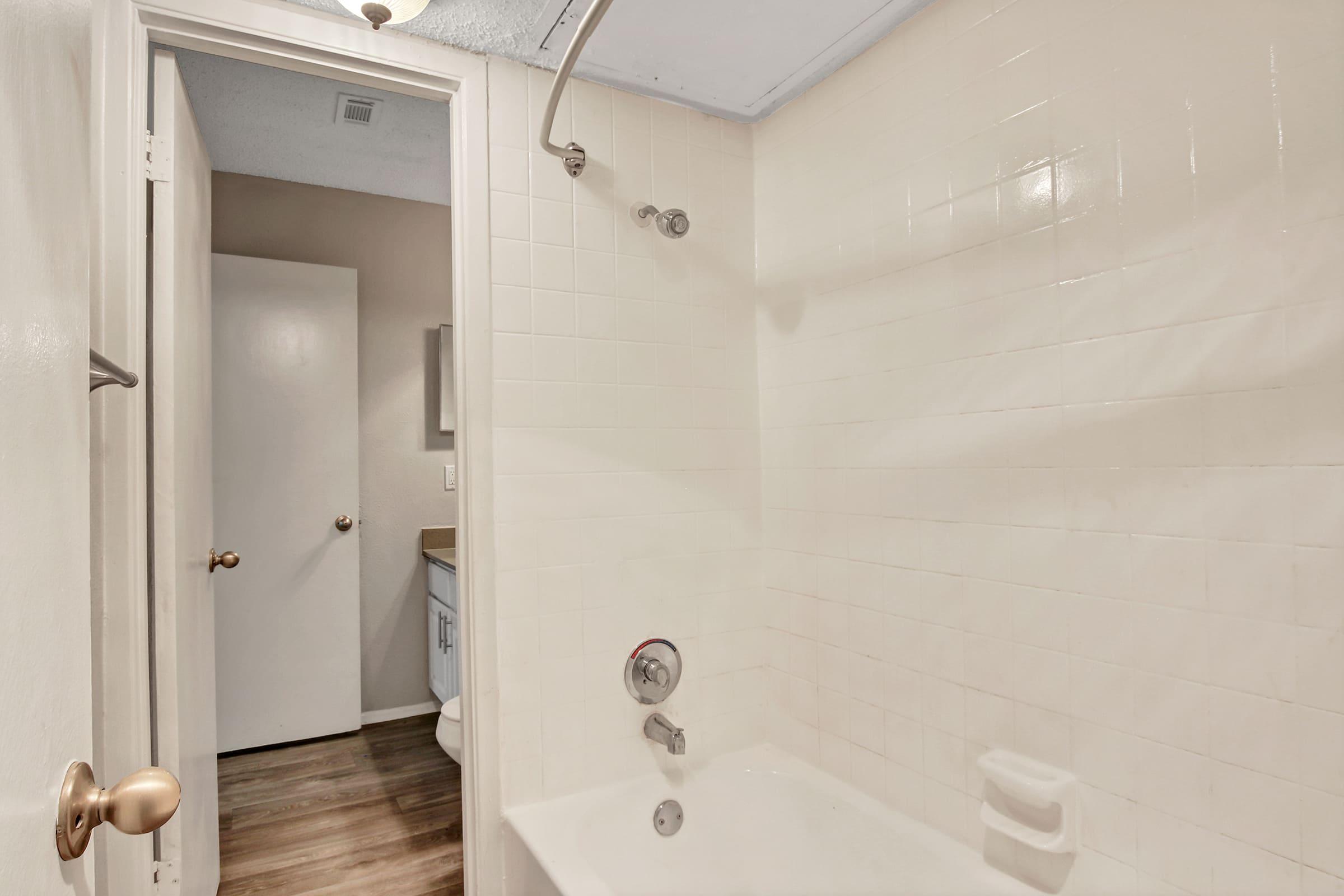 a close up of a shower in a small room