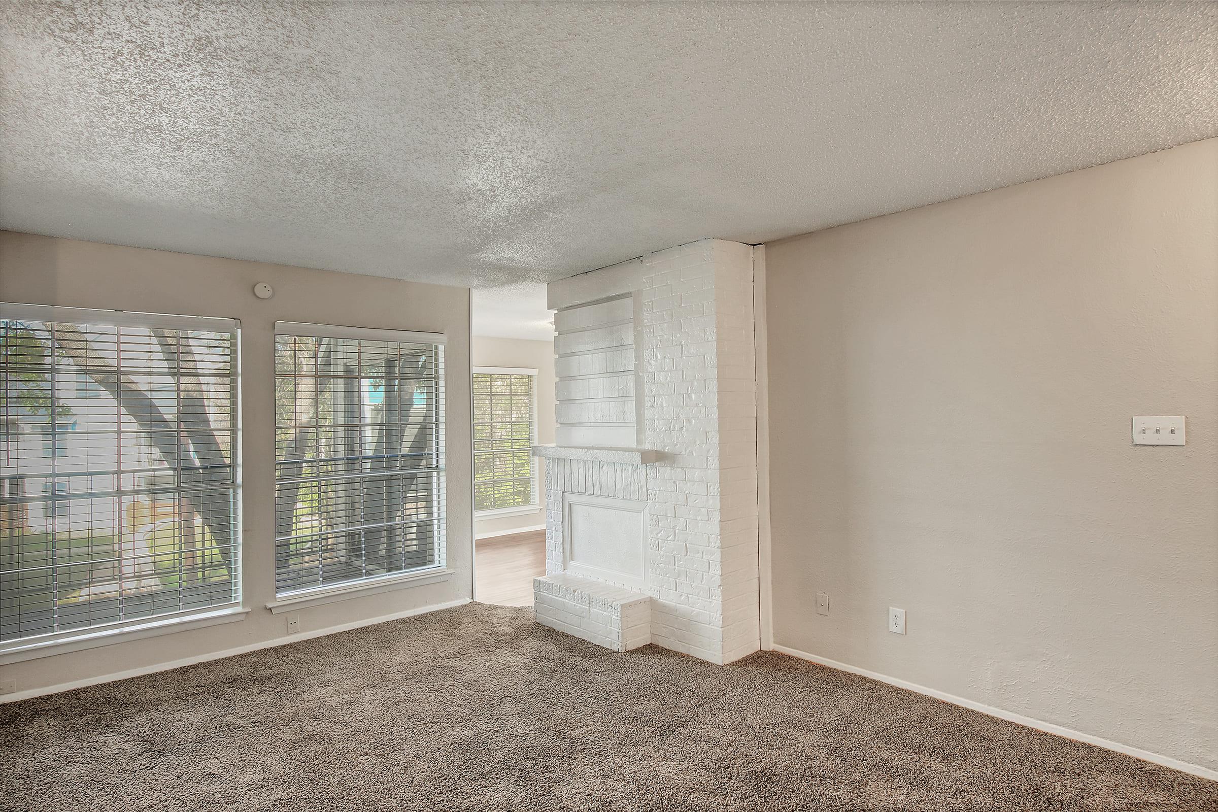 a room filled with furniture and a large window