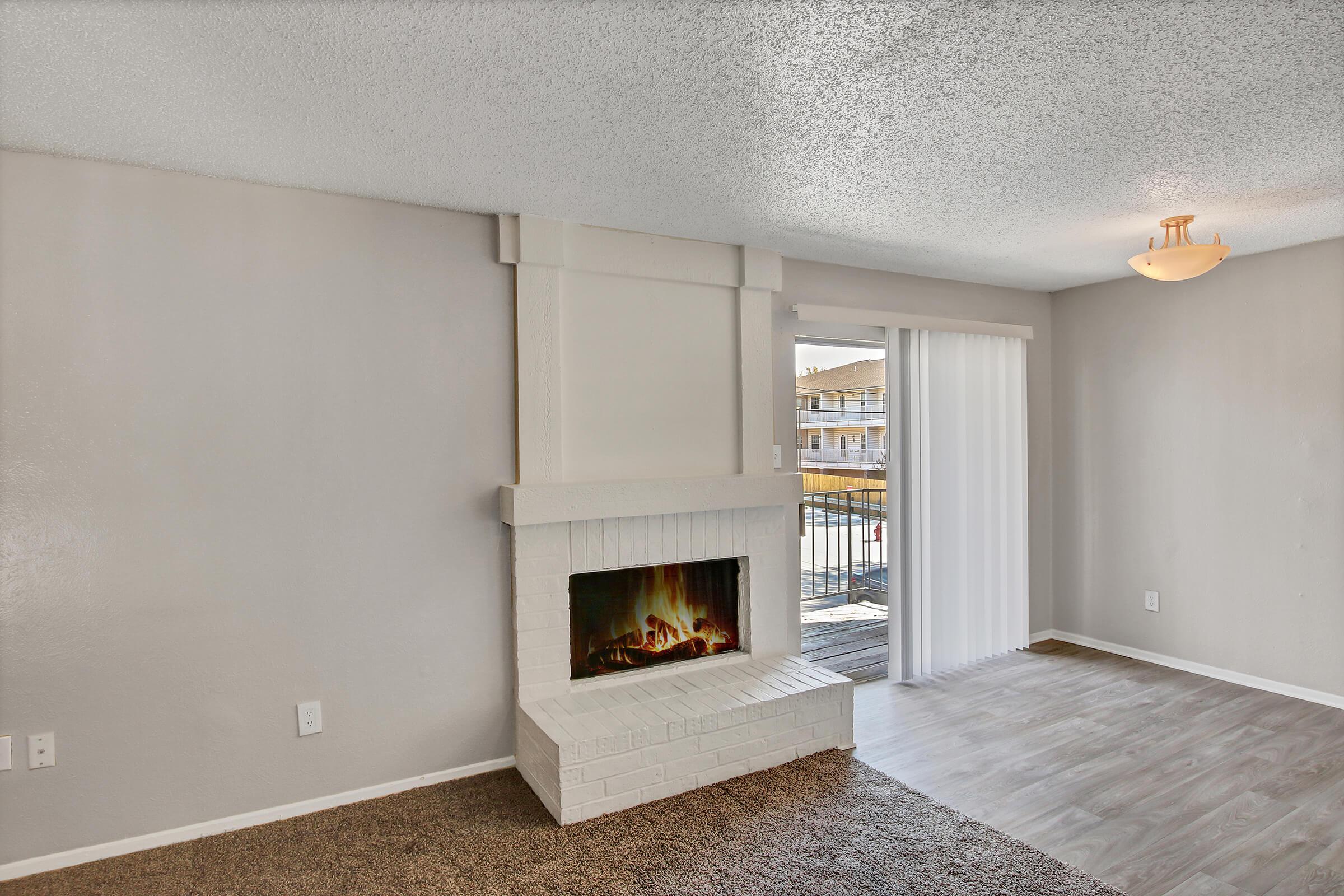 a room filled with furniture and a large window