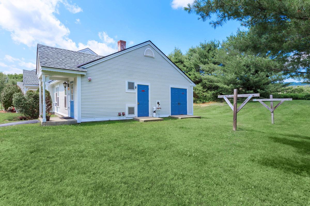 a large lawn in front of a house