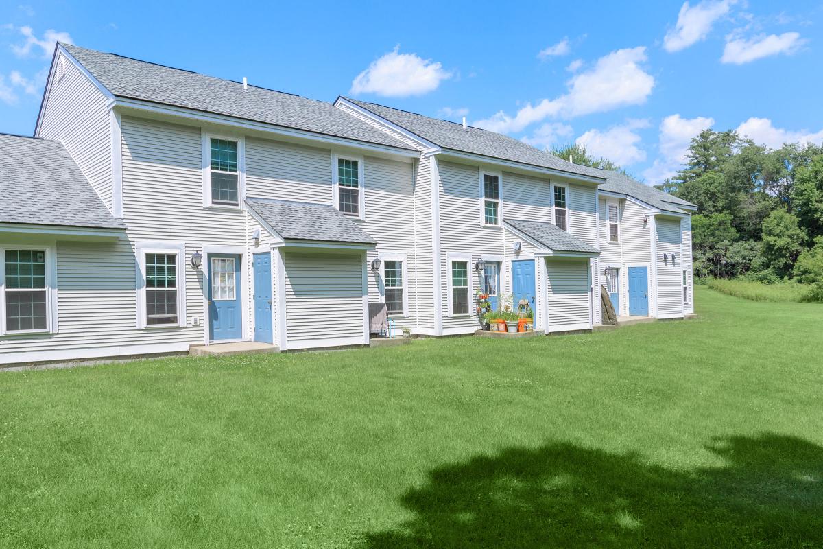 a large lawn in front of a house